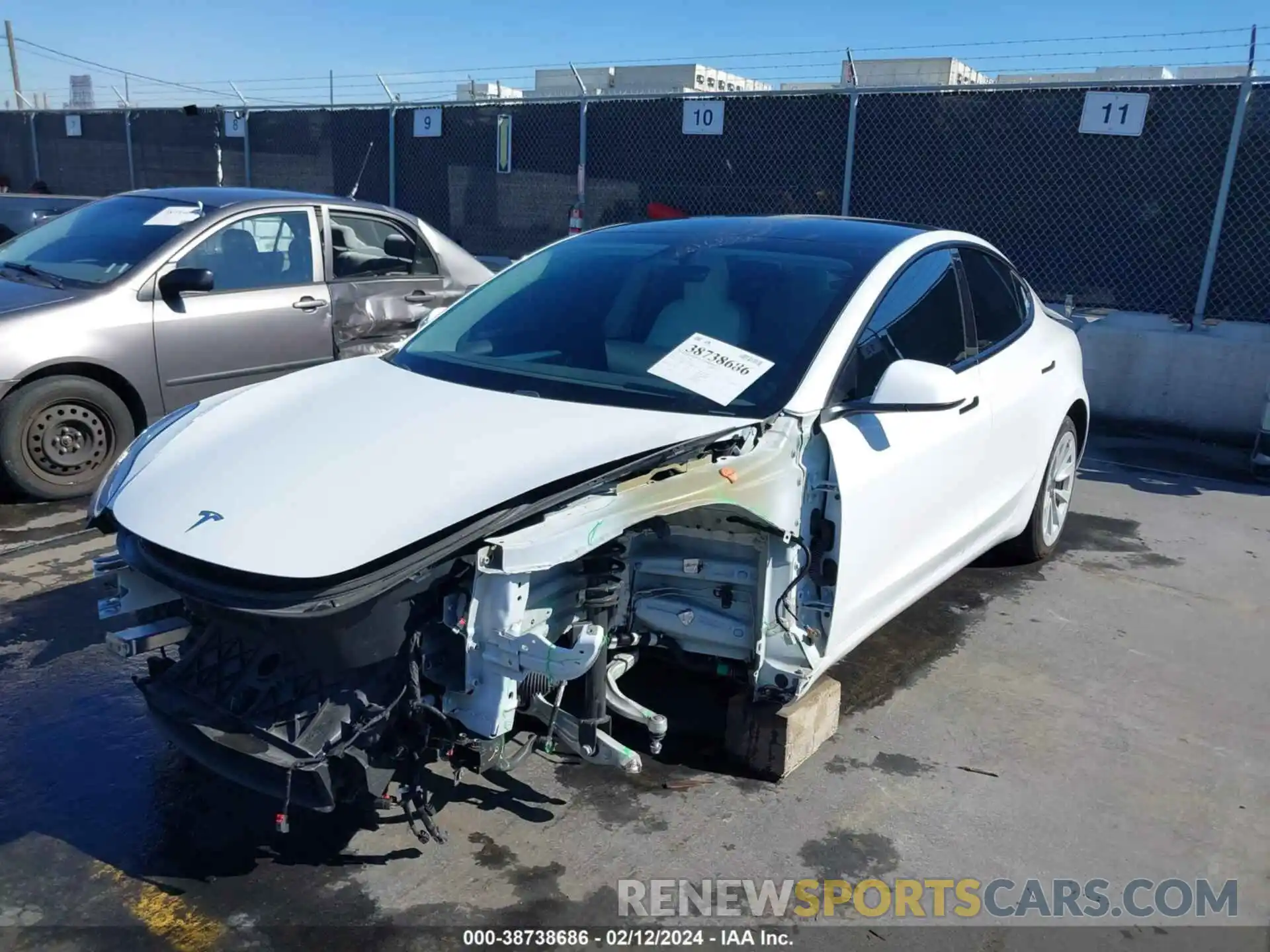 2 Photograph of a damaged car 5YJ3E1EA1MF978102 TESLA MODEL 3 2021