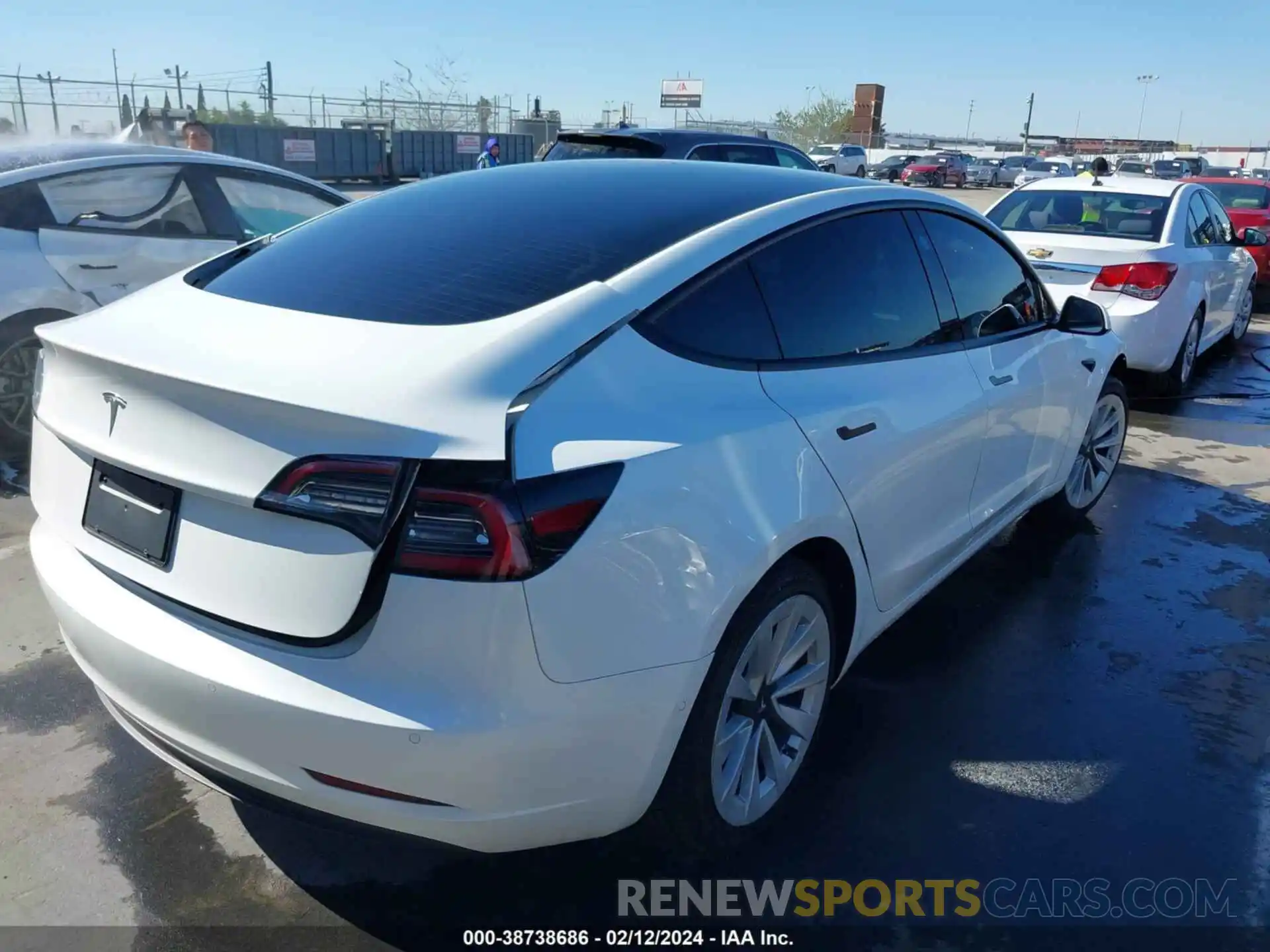 4 Photograph of a damaged car 5YJ3E1EA1MF978102 TESLA MODEL 3 2021