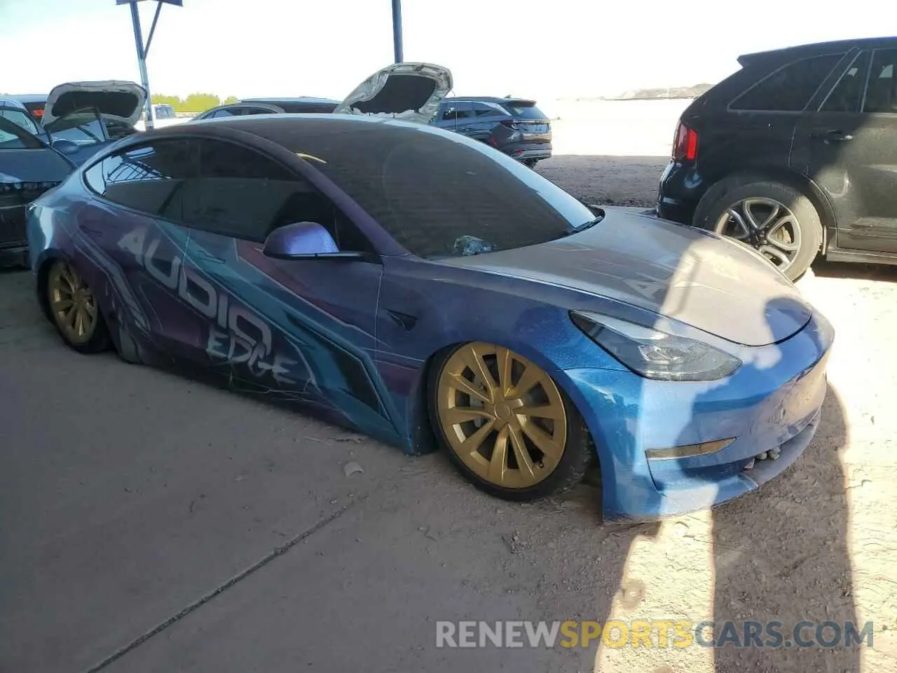 4 Photograph of a damaged car 5YJ3E1EA1MF990816 TESLA MODEL 3 2021