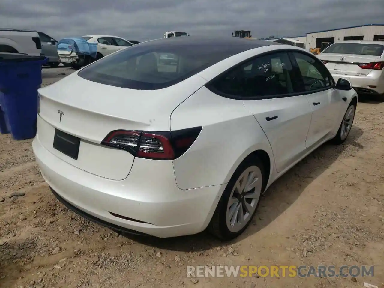 4 Photograph of a damaged car 5YJ3E1EA1MF990850 TESLA MODEL 3 2021