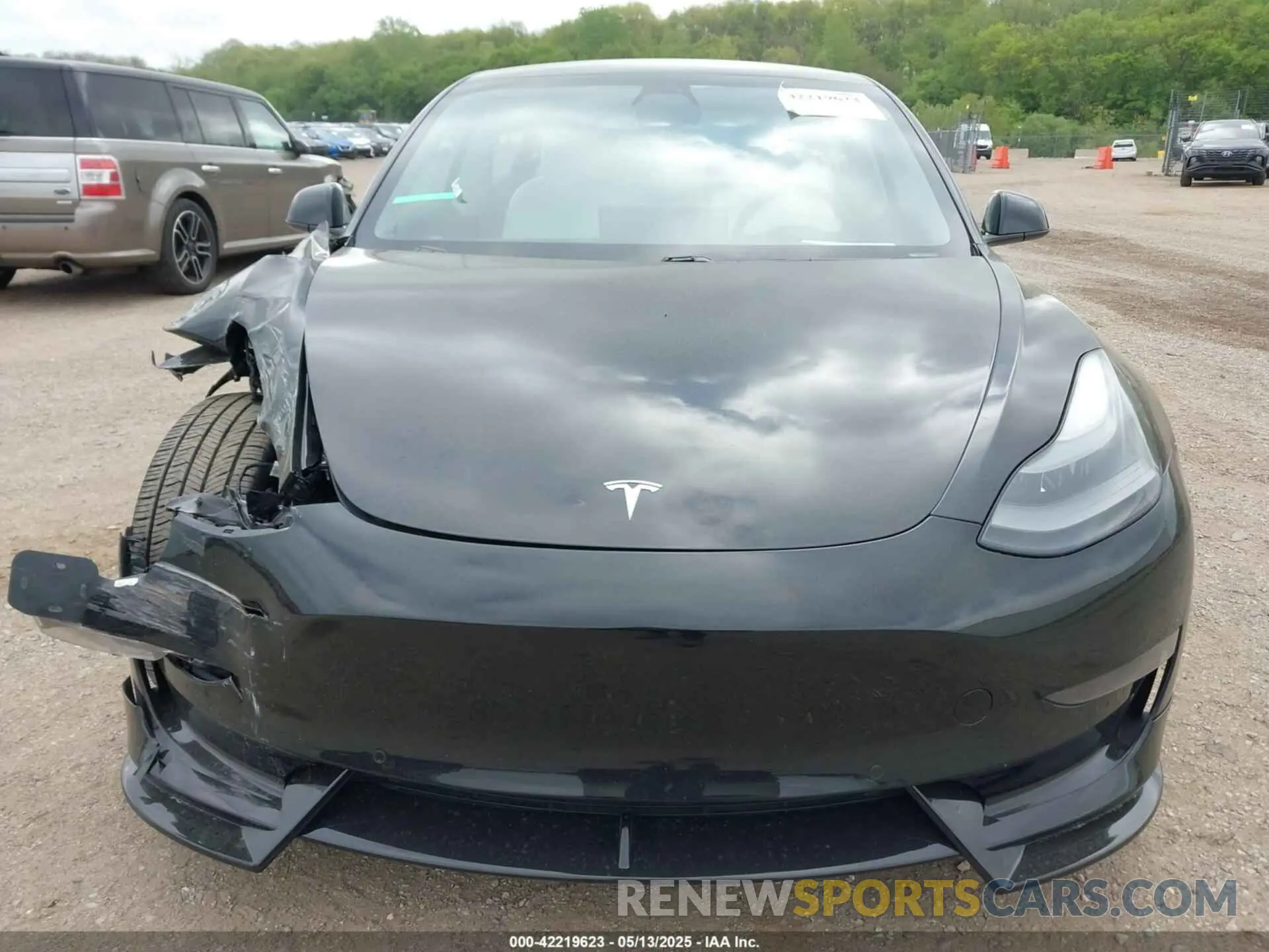12 Photograph of a damaged car 5YJ3E1EA1MF994980 TESLA MODEL 3 2021
