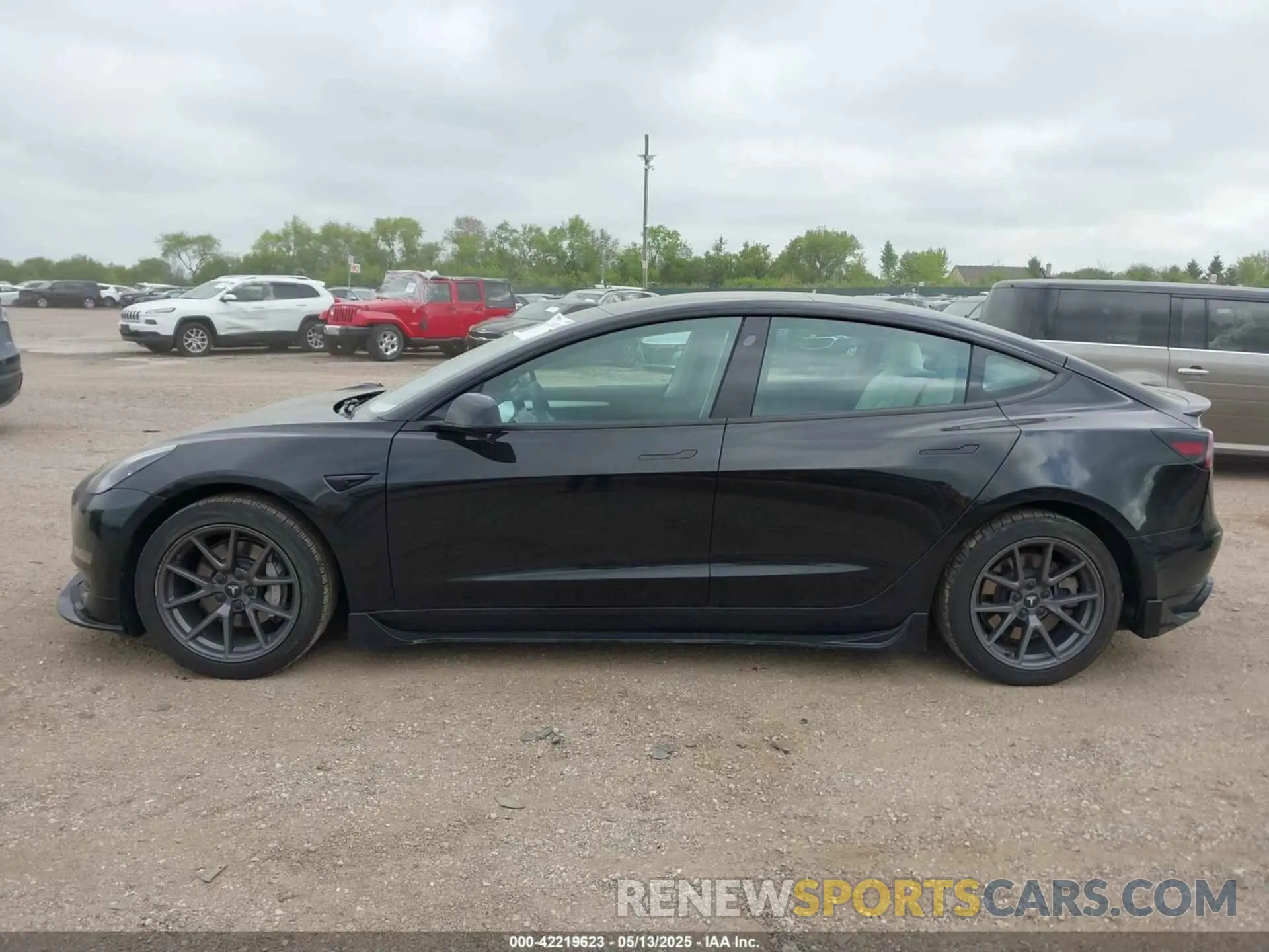14 Photograph of a damaged car 5YJ3E1EA1MF994980 TESLA MODEL 3 2021