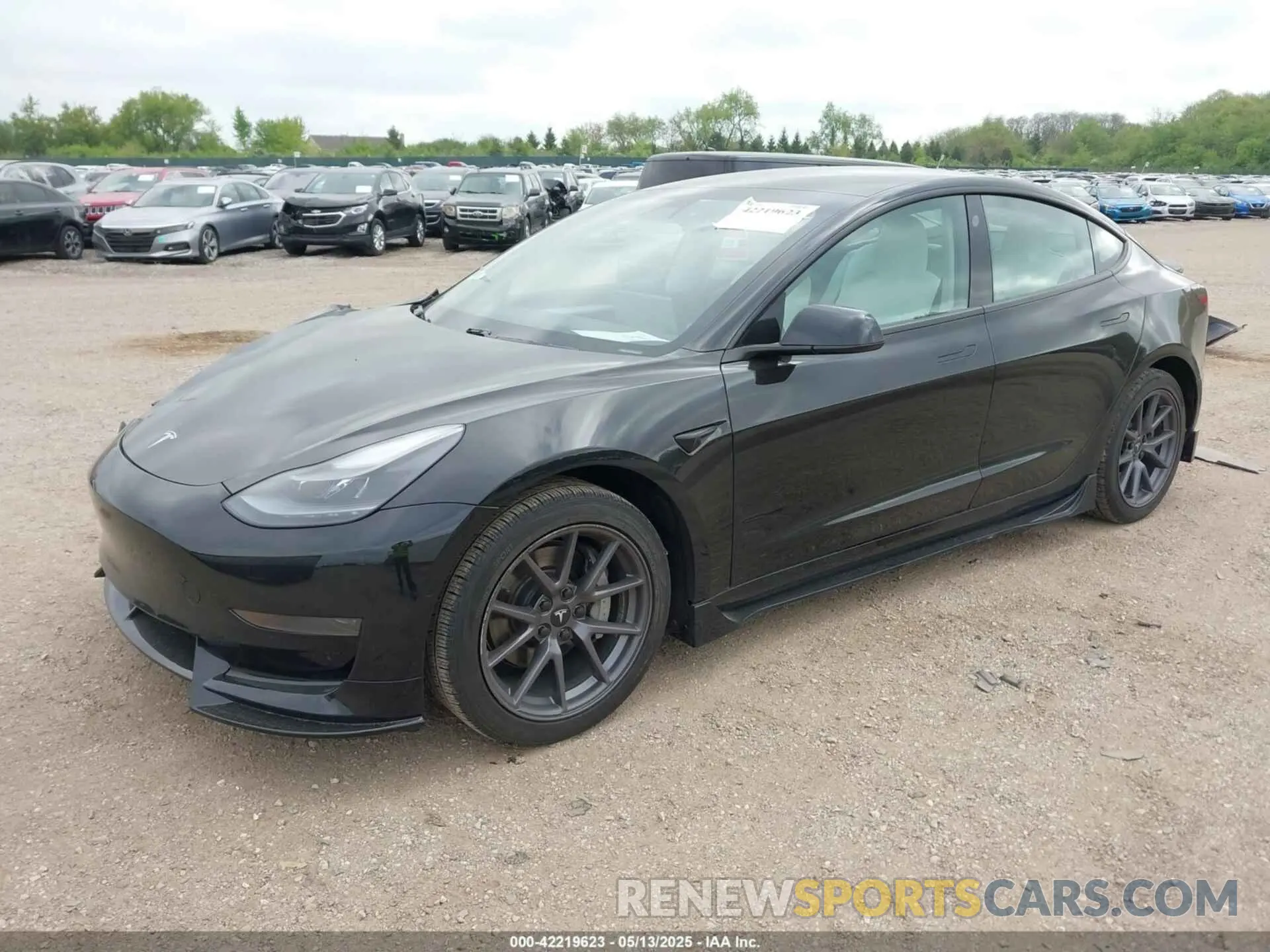 2 Photograph of a damaged car 5YJ3E1EA1MF994980 TESLA MODEL 3 2021