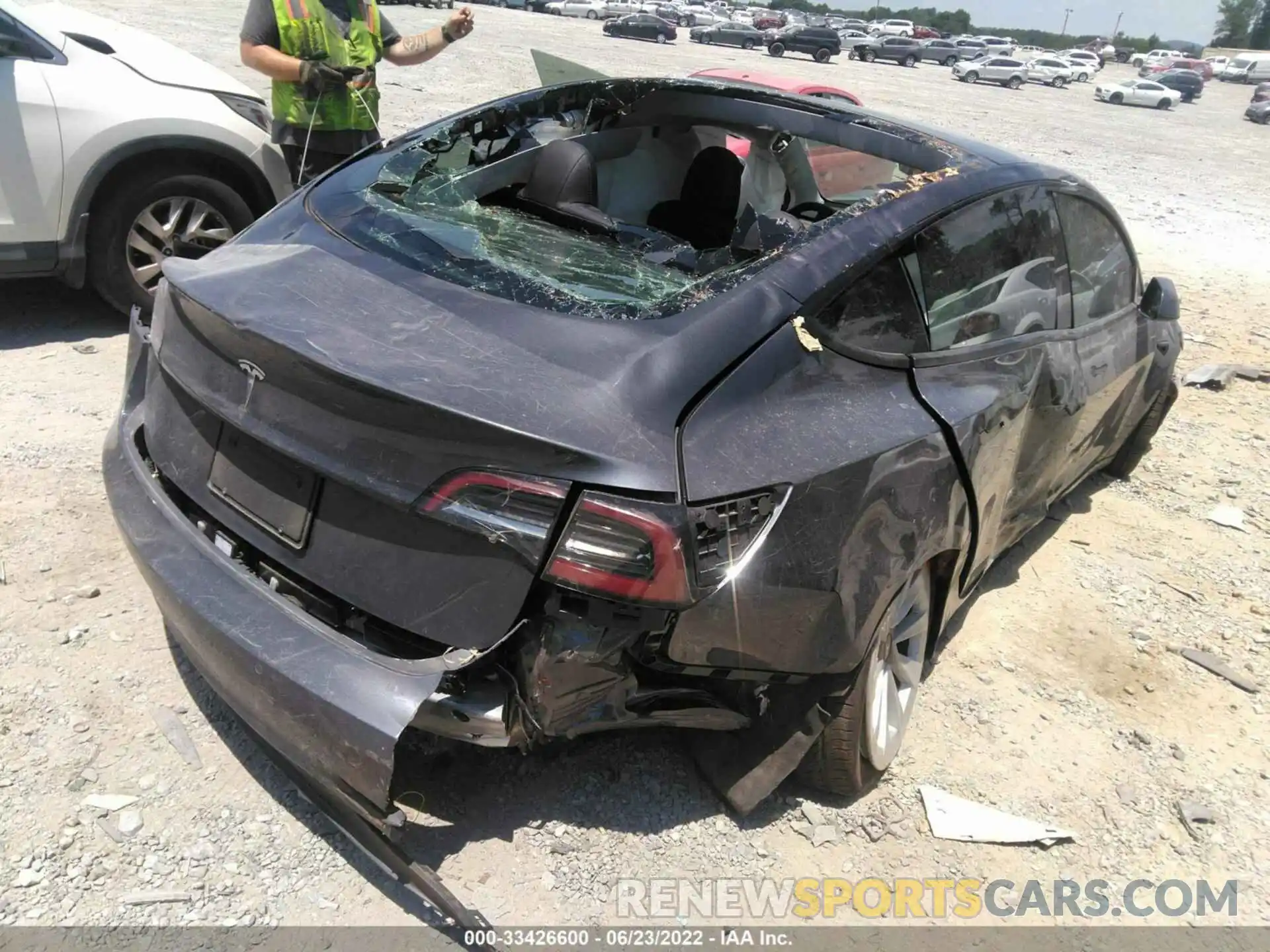 4 Photograph of a damaged car 5YJ3E1EA2MF020702 TESLA MODEL 3 2021