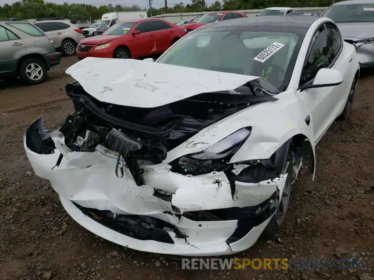 2 Photograph of a damaged car 5YJ3E1EA2MF024880 TESLA MODEL 3 2021