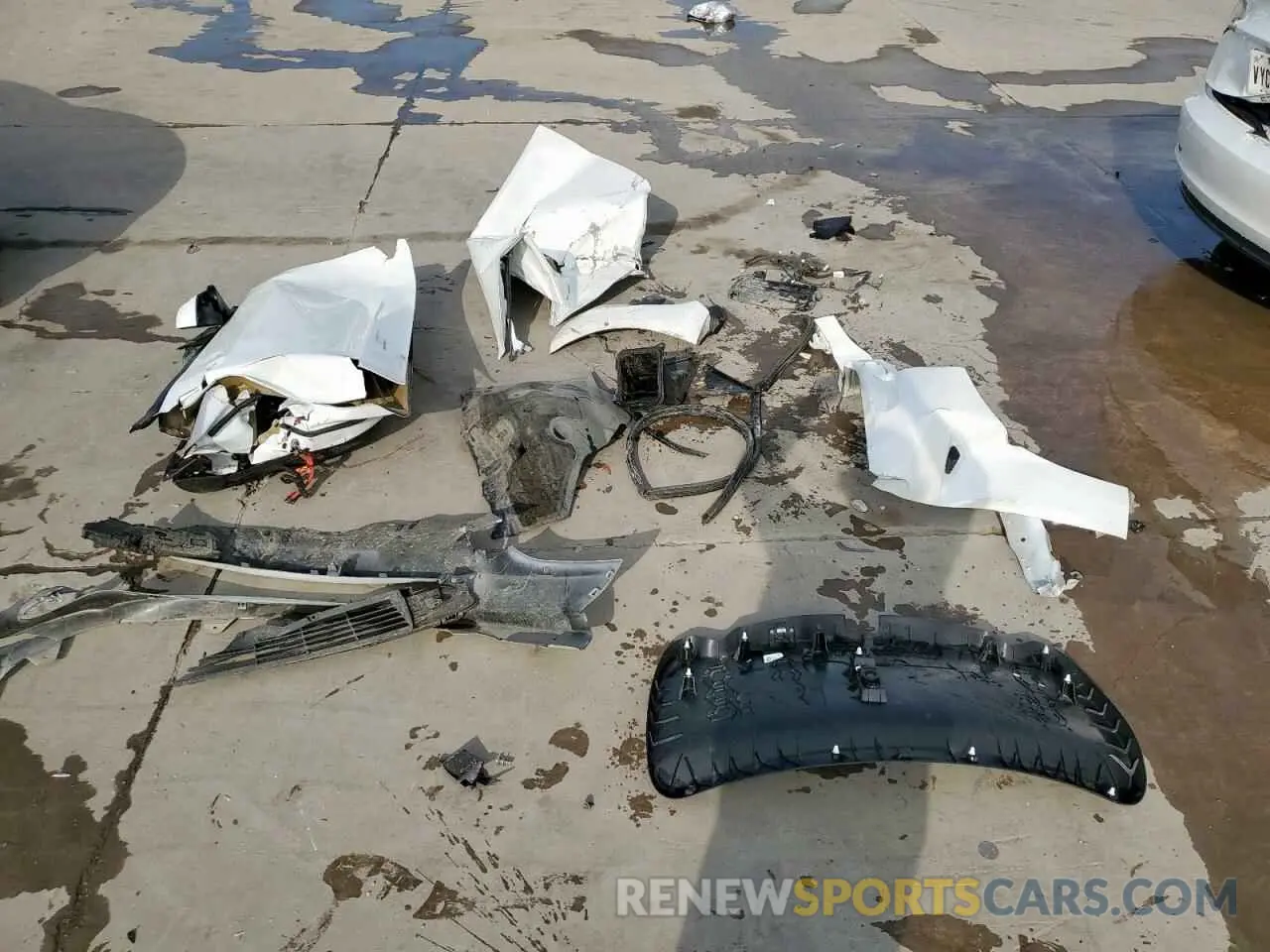 12 Photograph of a damaged car 5YJ3E1EA2MF028623 TESLA MODEL 3 2021