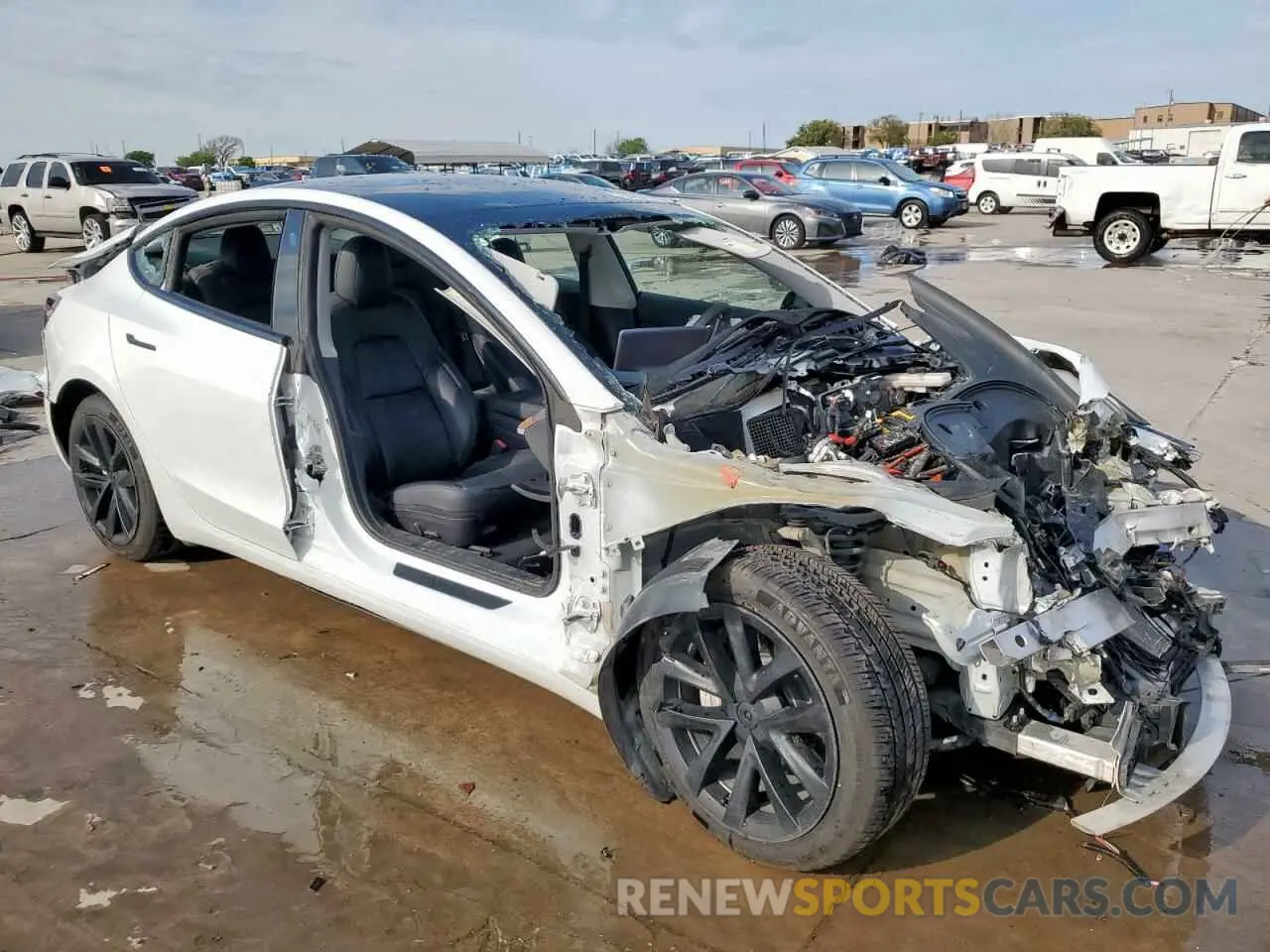 4 Photograph of a damaged car 5YJ3E1EA2MF028623 TESLA MODEL 3 2021