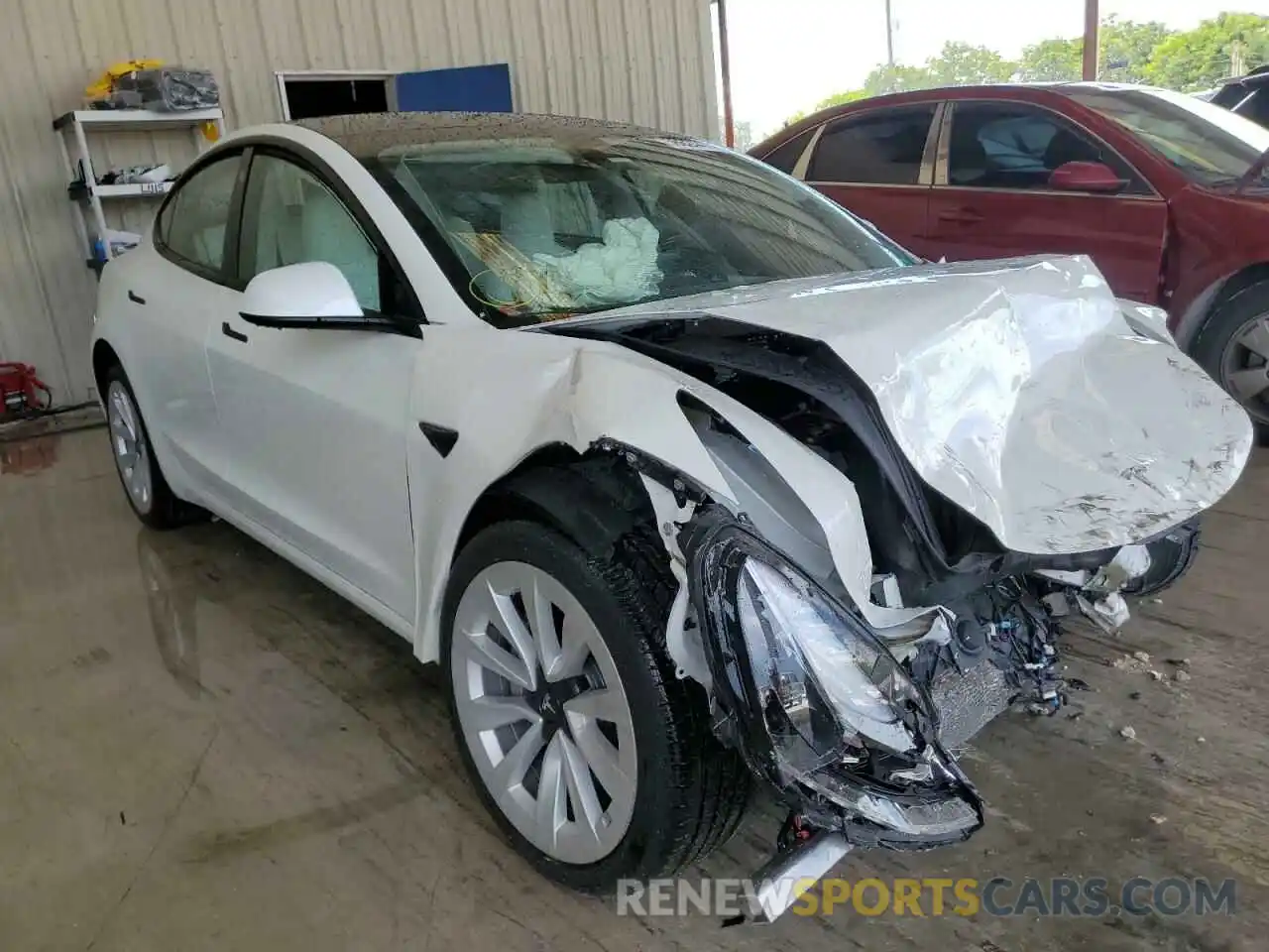 1 Photograph of a damaged car 5YJ3E1EA2MF032378 TESLA MODEL 3 2021