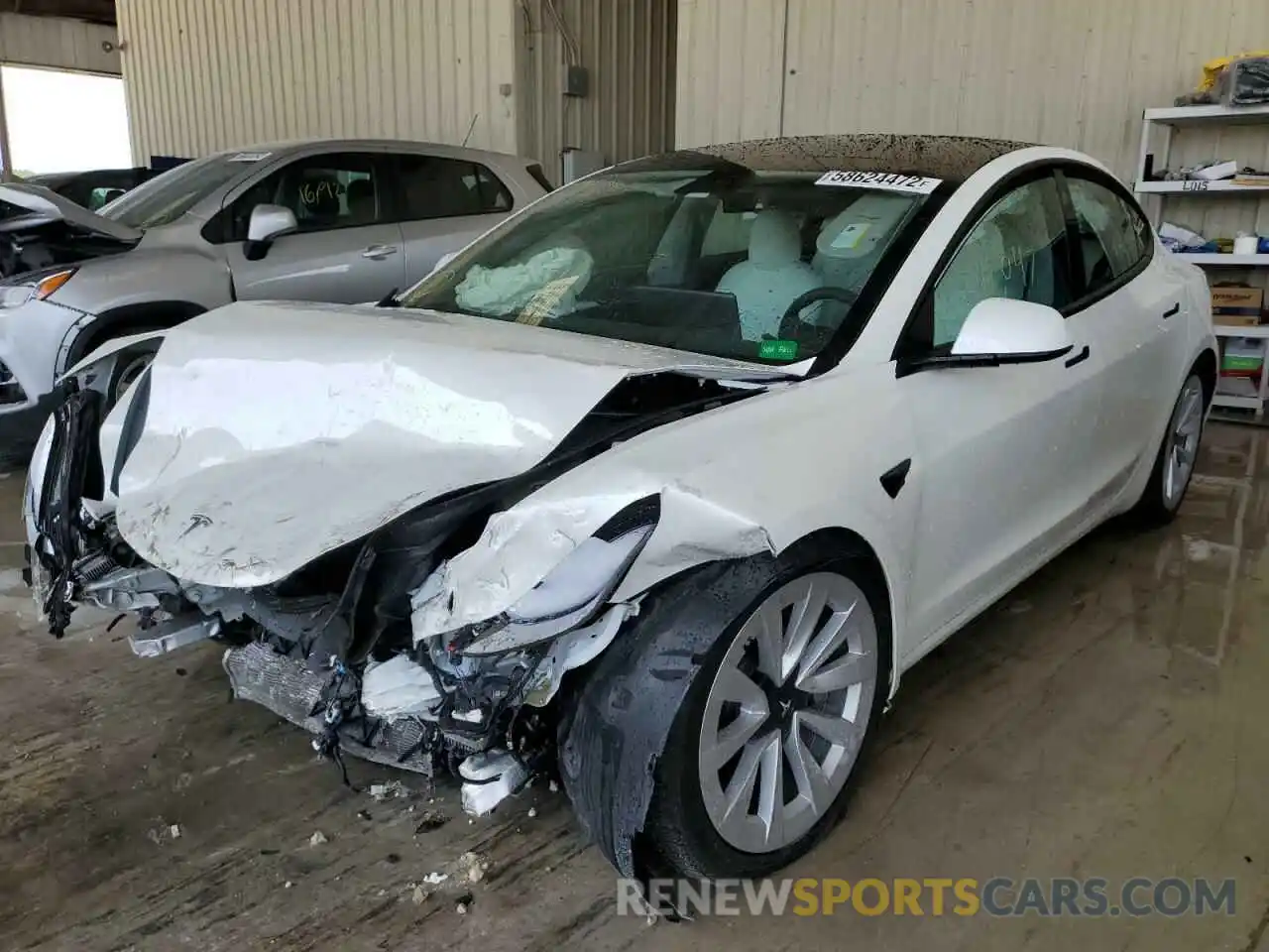 2 Photograph of a damaged car 5YJ3E1EA2MF032378 TESLA MODEL 3 2021