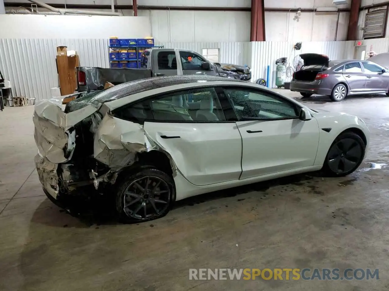 3 Photograph of a damaged car 5YJ3E1EA2MF058186 TESLA MODEL 3 2021
