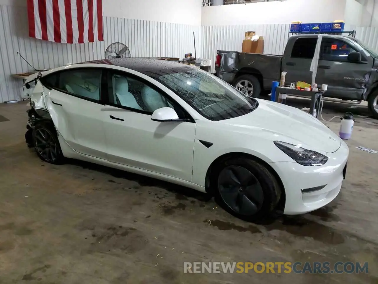 4 Photograph of a damaged car 5YJ3E1EA2MF058186 TESLA MODEL 3 2021