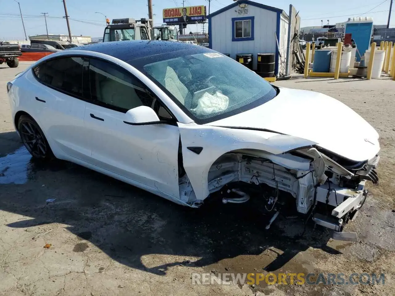 4 Photograph of a damaged car 5YJ3E1EA2MF068488 TESLA MODEL 3 2021