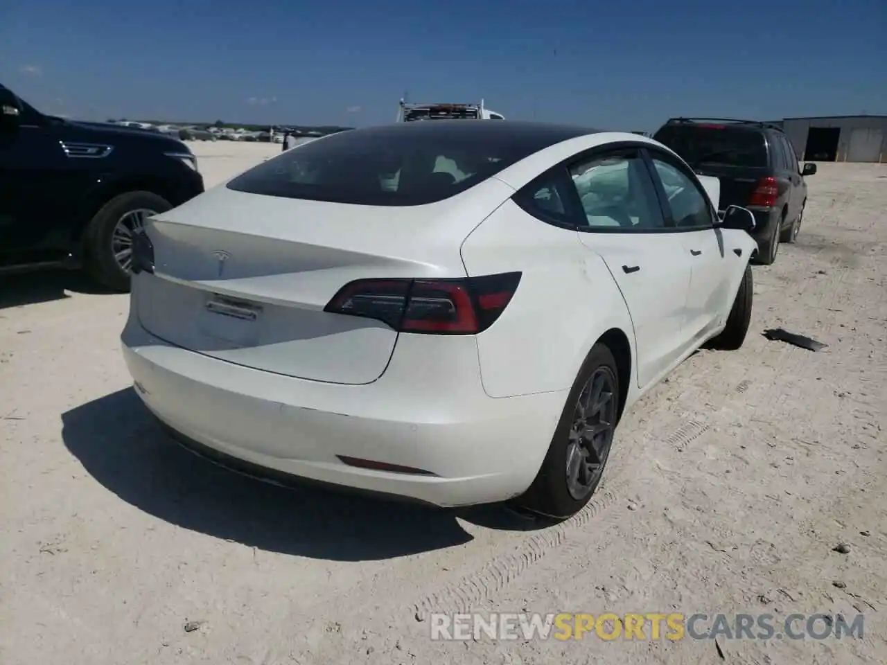 4 Photograph of a damaged car 5YJ3E1EA2MF095397 TESLA MODEL 3 2021