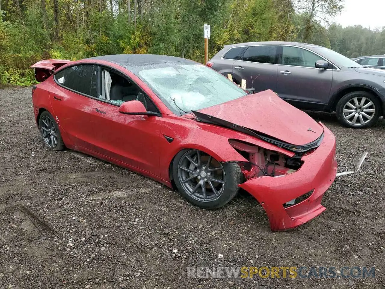 4 Photograph of a damaged car 5YJ3E1EA2MF857448 TESLA MODEL 3 2021