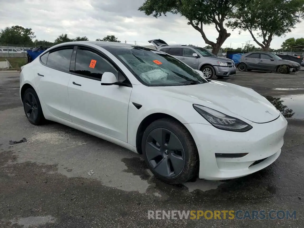 4 Photograph of a damaged car 5YJ3E1EA2MF859832 TESLA MODEL 3 2021
