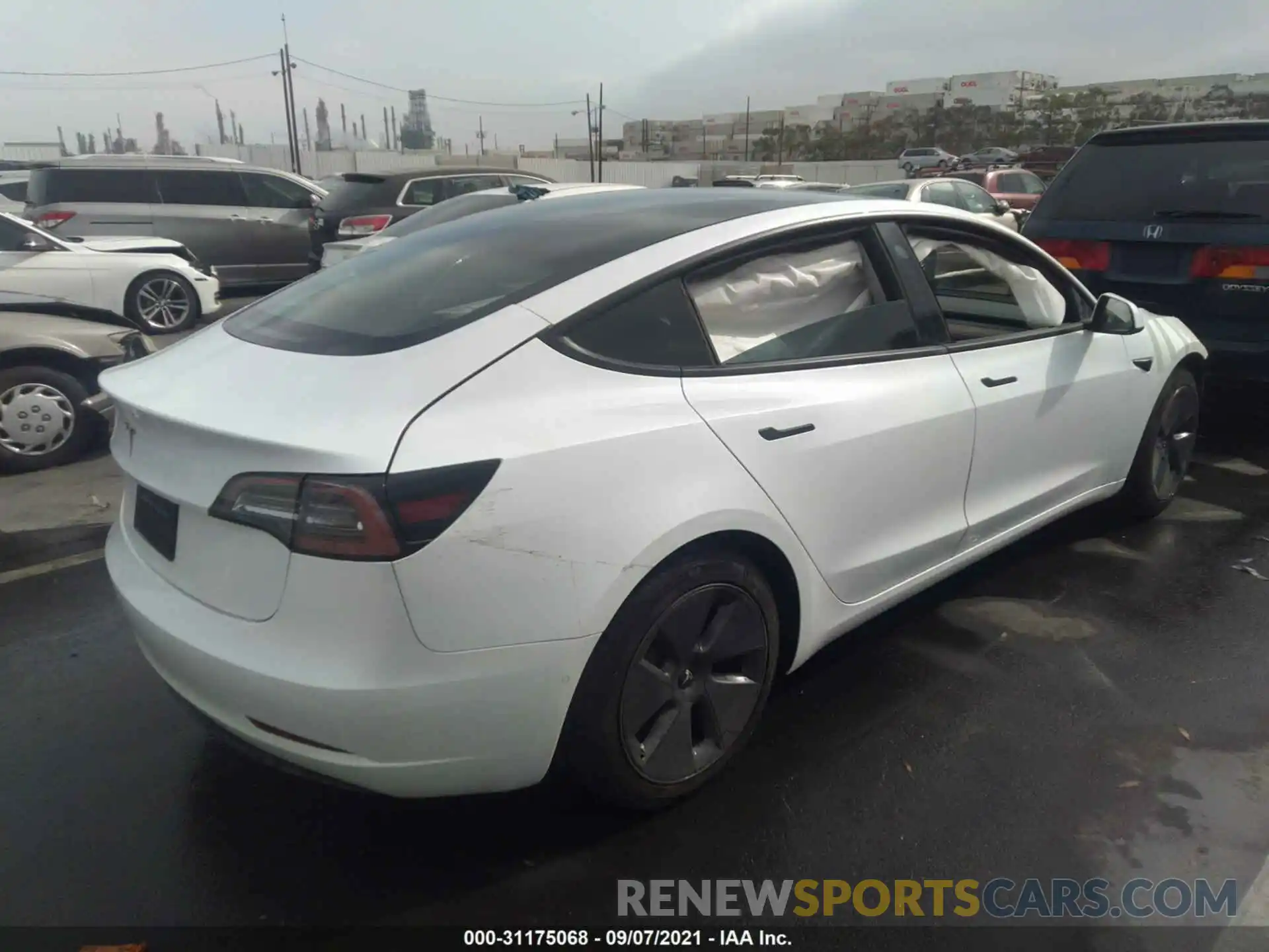 4 Photograph of a damaged car 5YJ3E1EA2MF867736 TESLA MODEL 3 2021