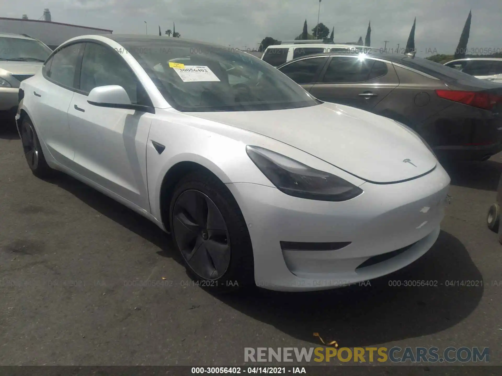 1 Photograph of a damaged car 5YJ3E1EA2MF873388 TESLA MODEL 3 2021