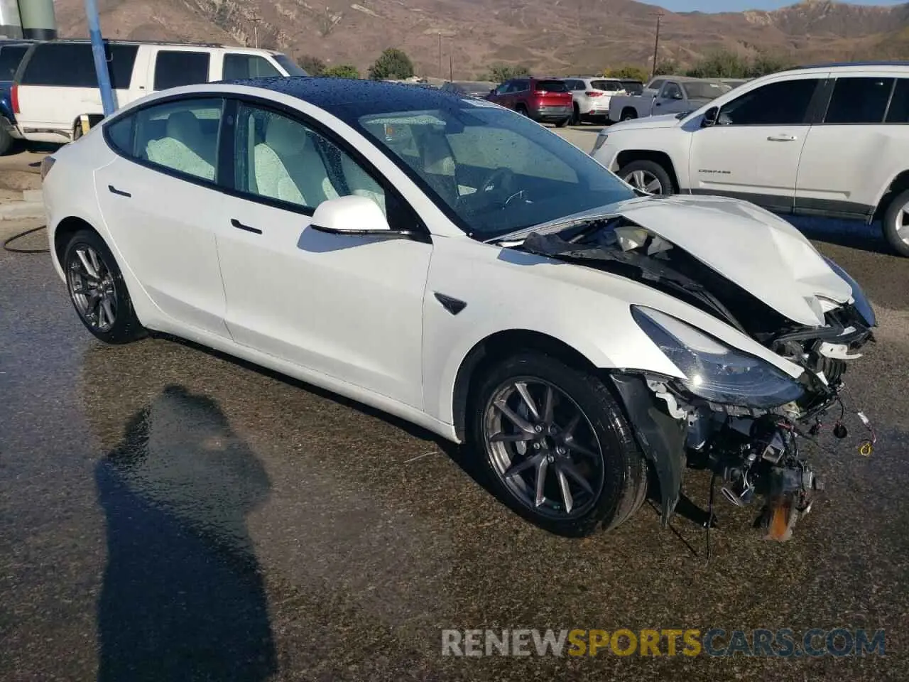 4 Photograph of a damaged car 5YJ3E1EA2MF873424 TESLA MODEL 3 2021