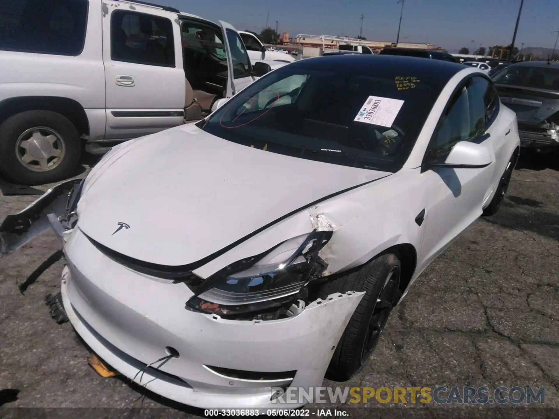 2 Photograph of a damaged car 5YJ3E1EA2MF874217 TESLA MODEL 3 2021