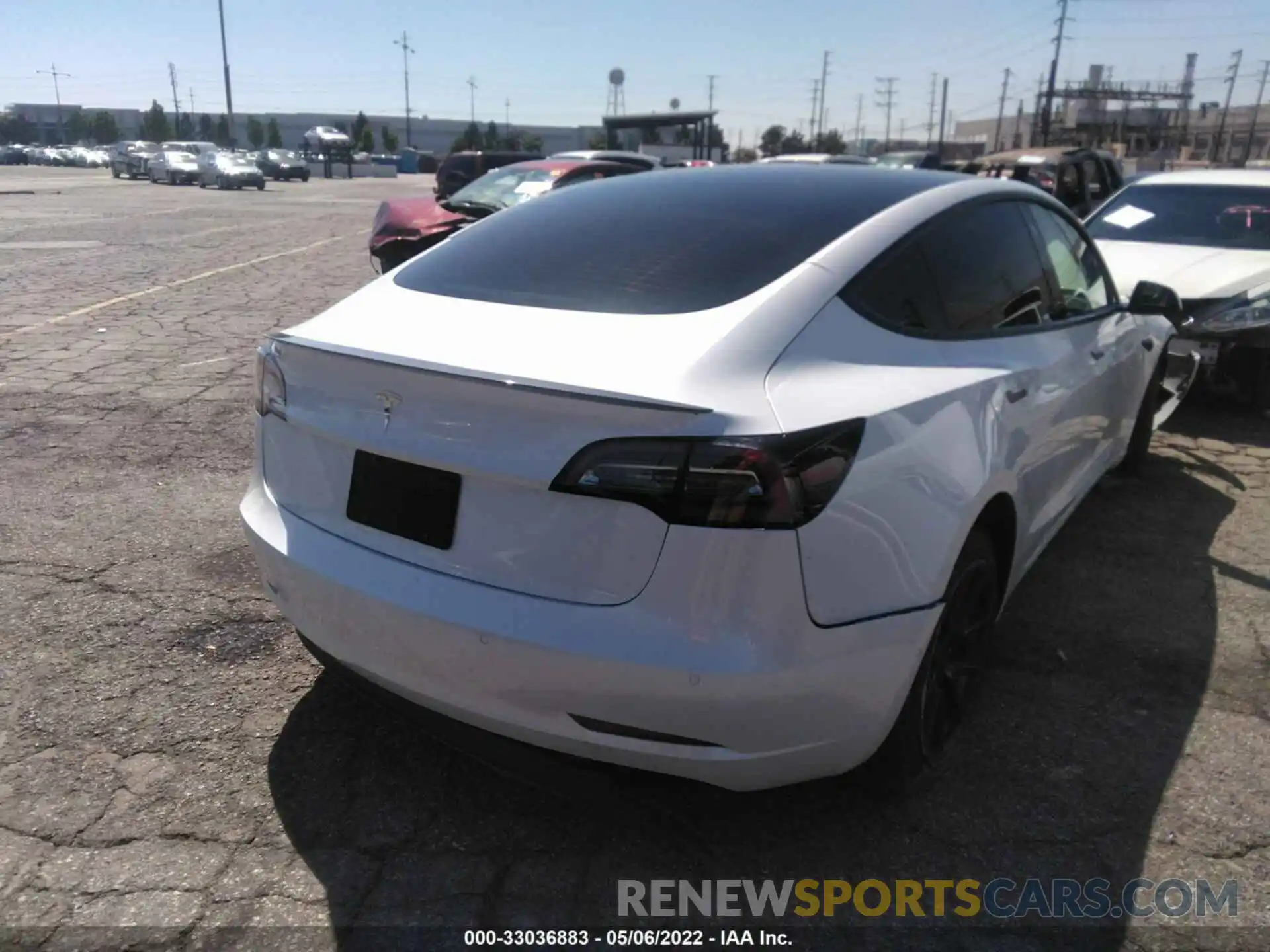 4 Photograph of a damaged car 5YJ3E1EA2MF874217 TESLA MODEL 3 2021