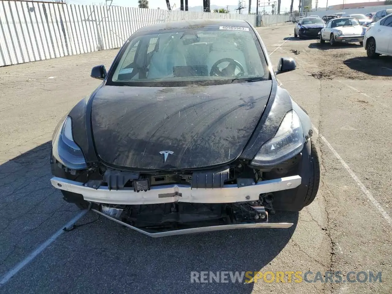 5 Photograph of a damaged car 5YJ3E1EA2MF878560 TESLA MODEL 3 2021