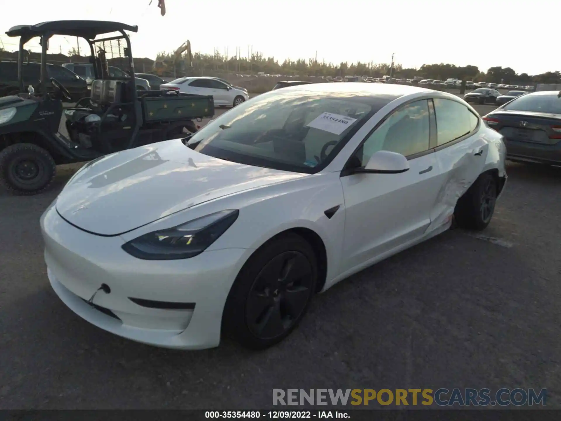 2 Photograph of a damaged car 5YJ3E1EA2MF908690 TESLA MODEL 3 2021