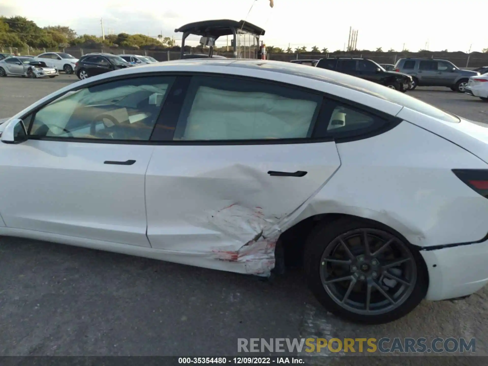 6 Photograph of a damaged car 5YJ3E1EA2MF908690 TESLA MODEL 3 2021