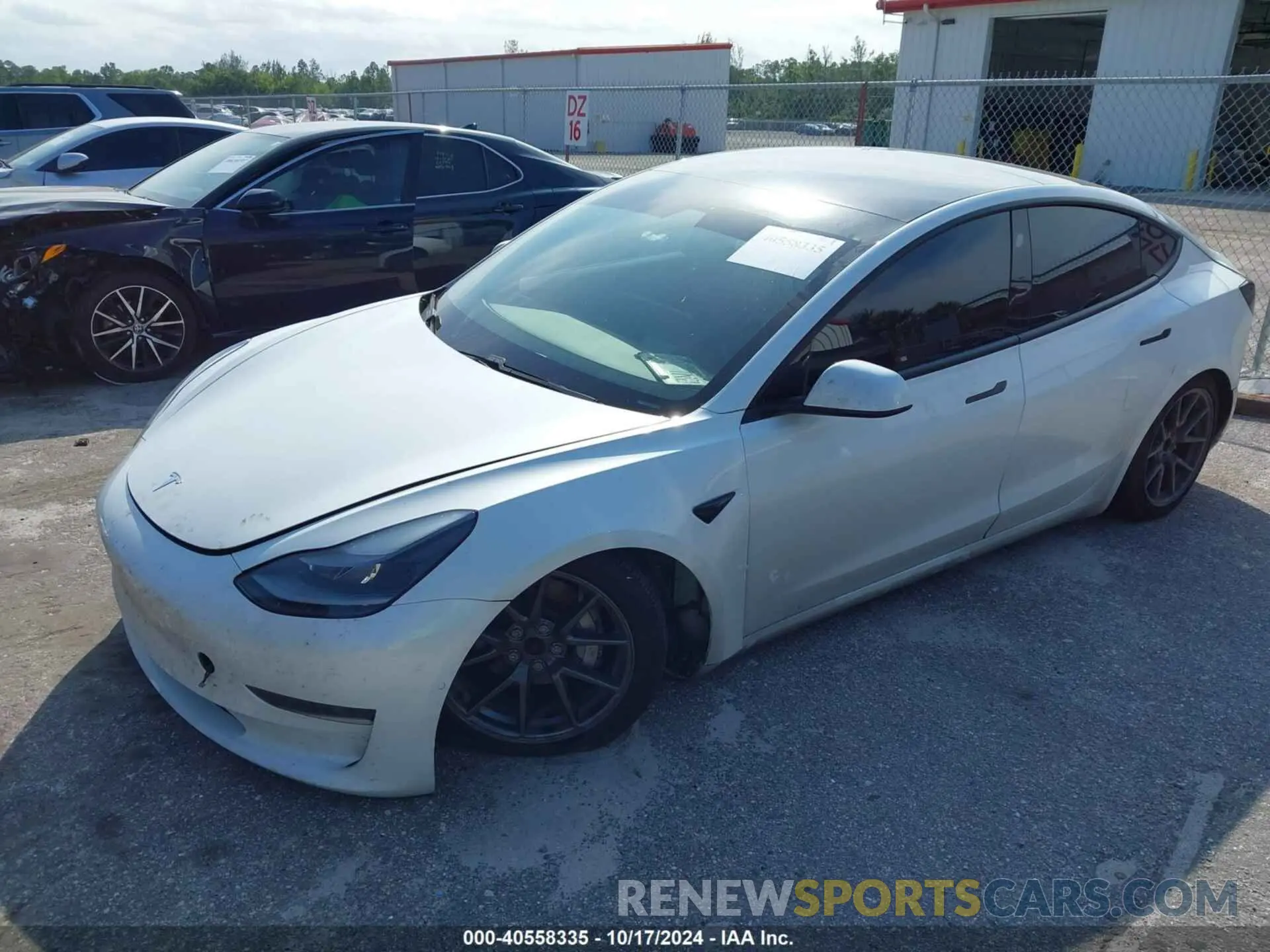 2 Photograph of a damaged car 5YJ3E1EA2MF921195 TESLA MODEL 3 2021