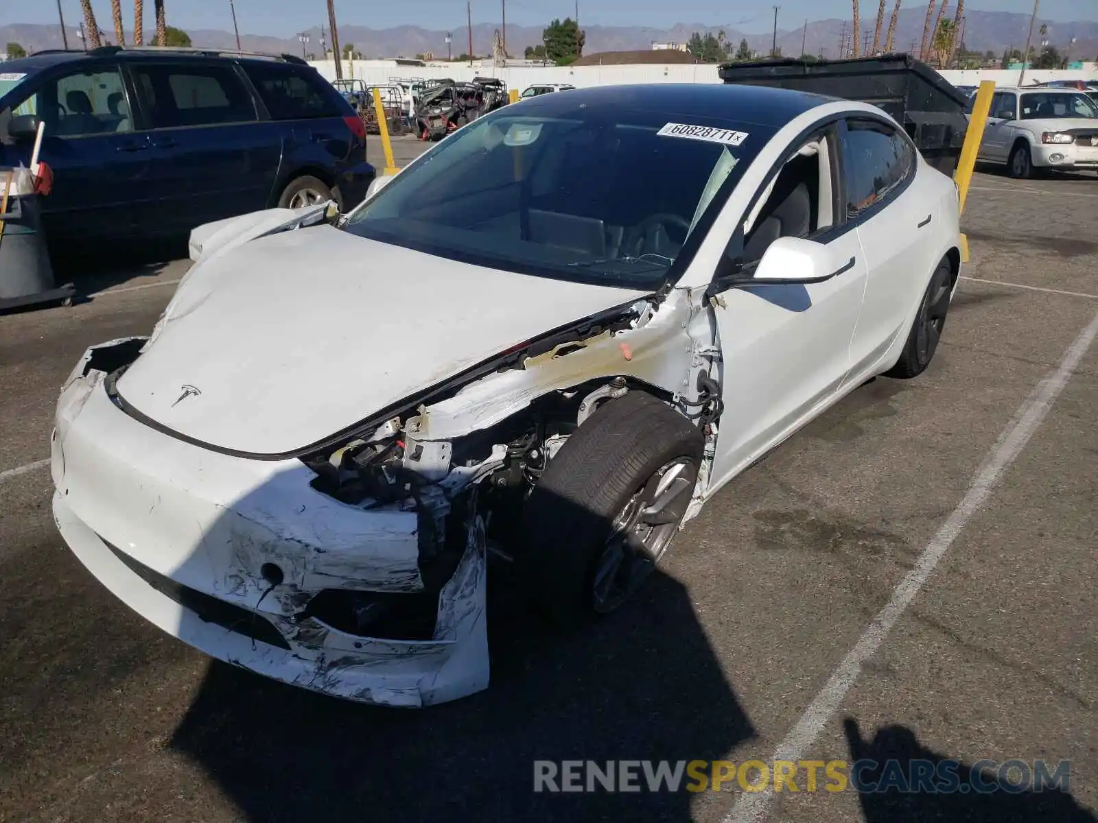 2 Photograph of a damaged car 5YJ3E1EA2MF930396 TESLA MODEL 3 2021