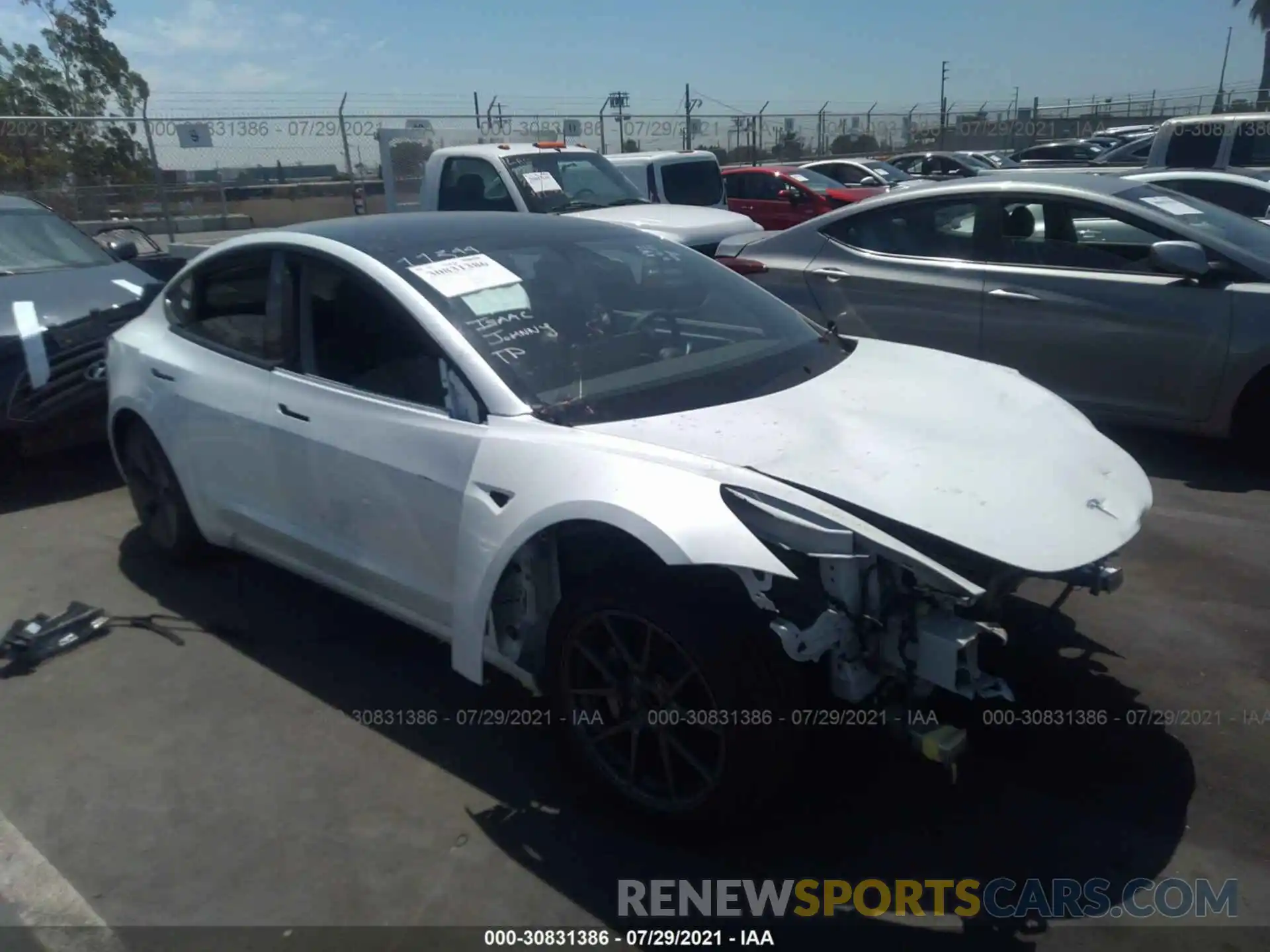 1 Photograph of a damaged car 5YJ3E1EA2MF930592 TESLA MODEL 3 2021