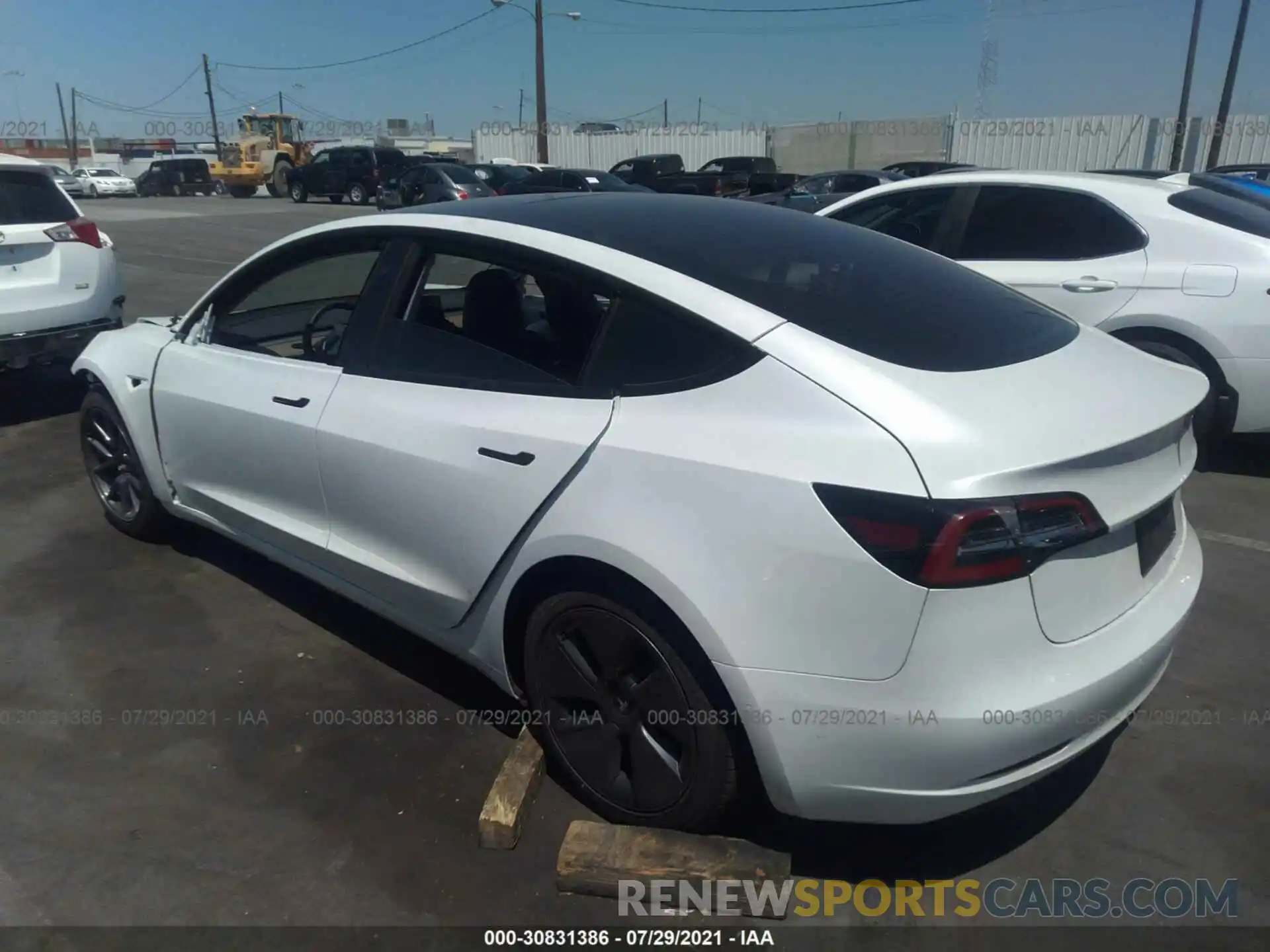 3 Photograph of a damaged car 5YJ3E1EA2MF930592 TESLA MODEL 3 2021