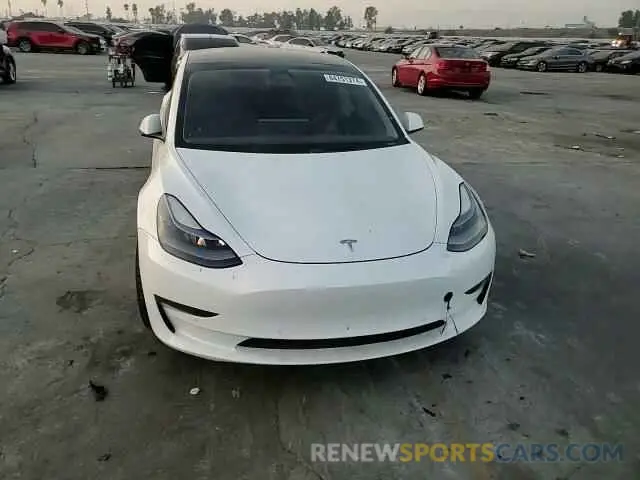 12 Photograph of a damaged car 5YJ3E1EA2MF940376 TESLA MODEL 3 2021