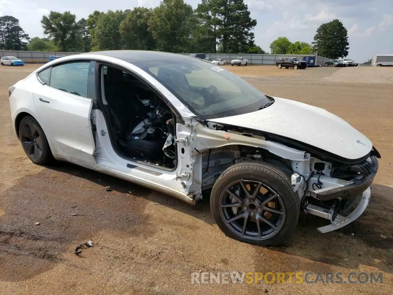 4 Photograph of a damaged car 5YJ3E1EA2MF965357 TESLA MODEL 3 2021