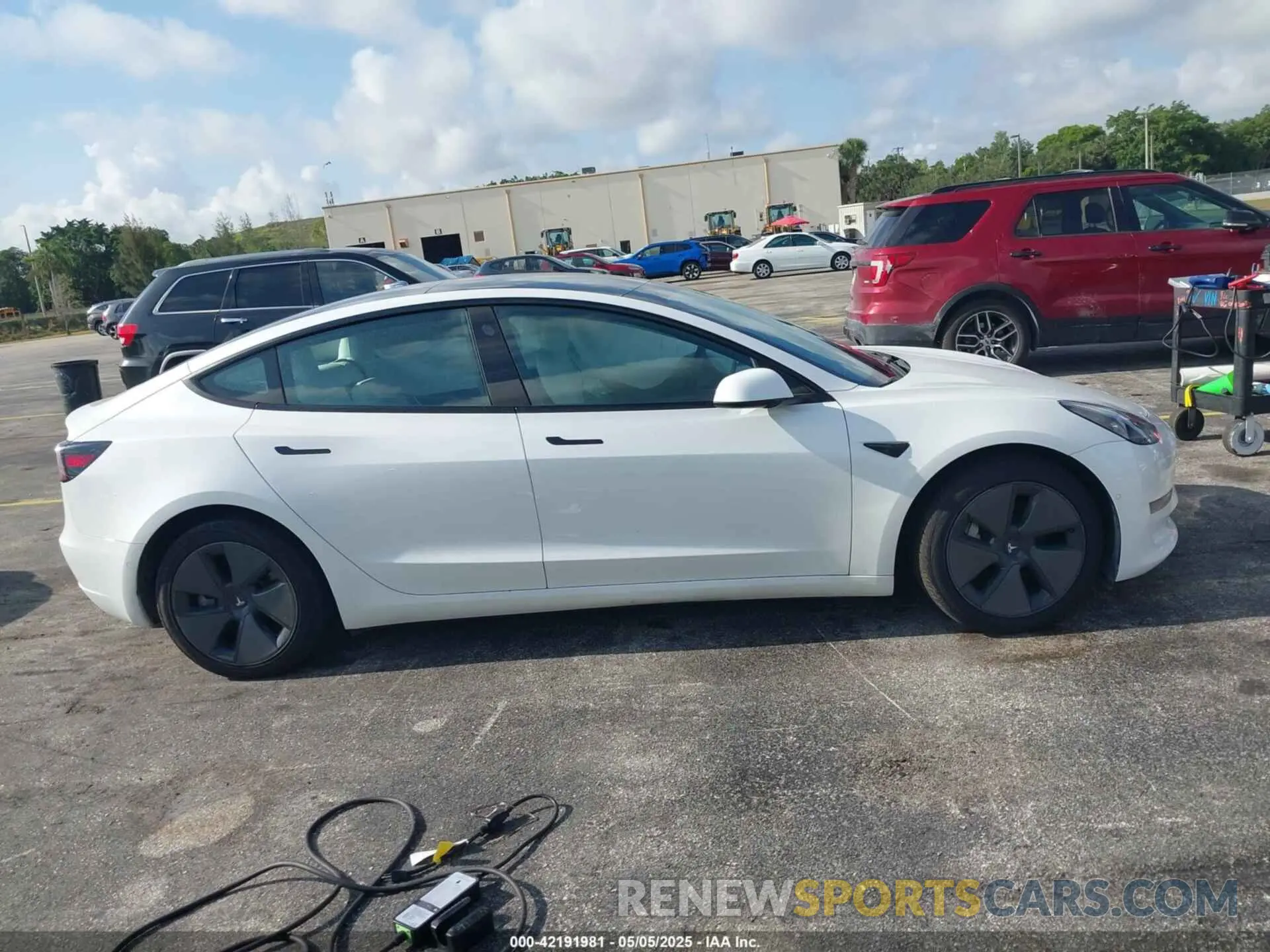 14 Photograph of a damaged car 5YJ3E1EA2MF973202 TESLA MODEL 3 2021