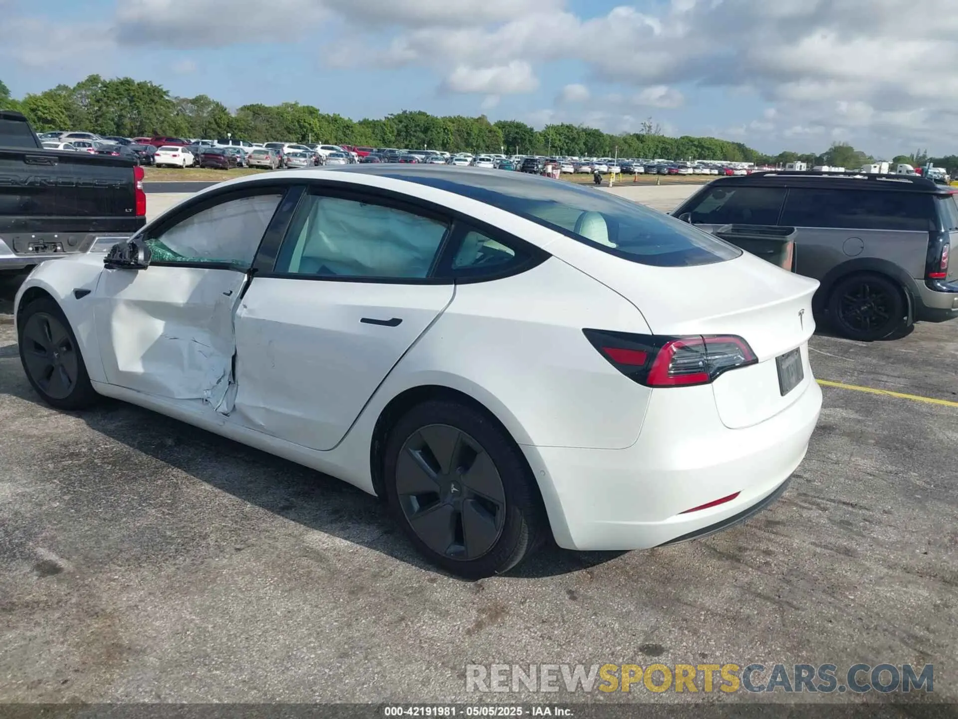 3 Photograph of a damaged car 5YJ3E1EA2MF973202 TESLA MODEL 3 2021