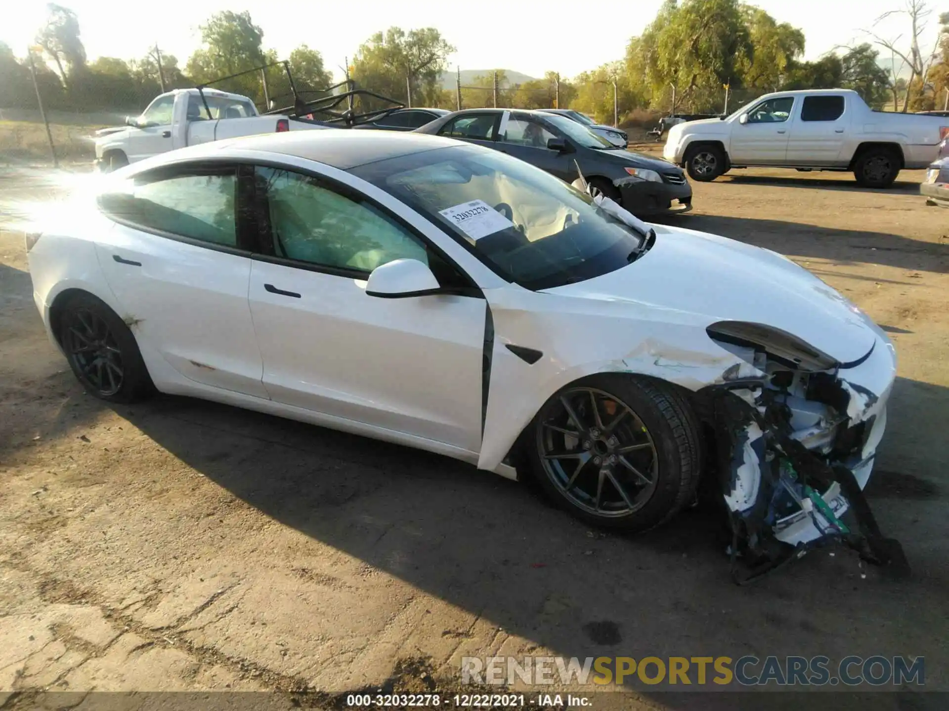 1 Photograph of a damaged car 5YJ3E1EA2MF976956 TESLA MODEL 3 2021