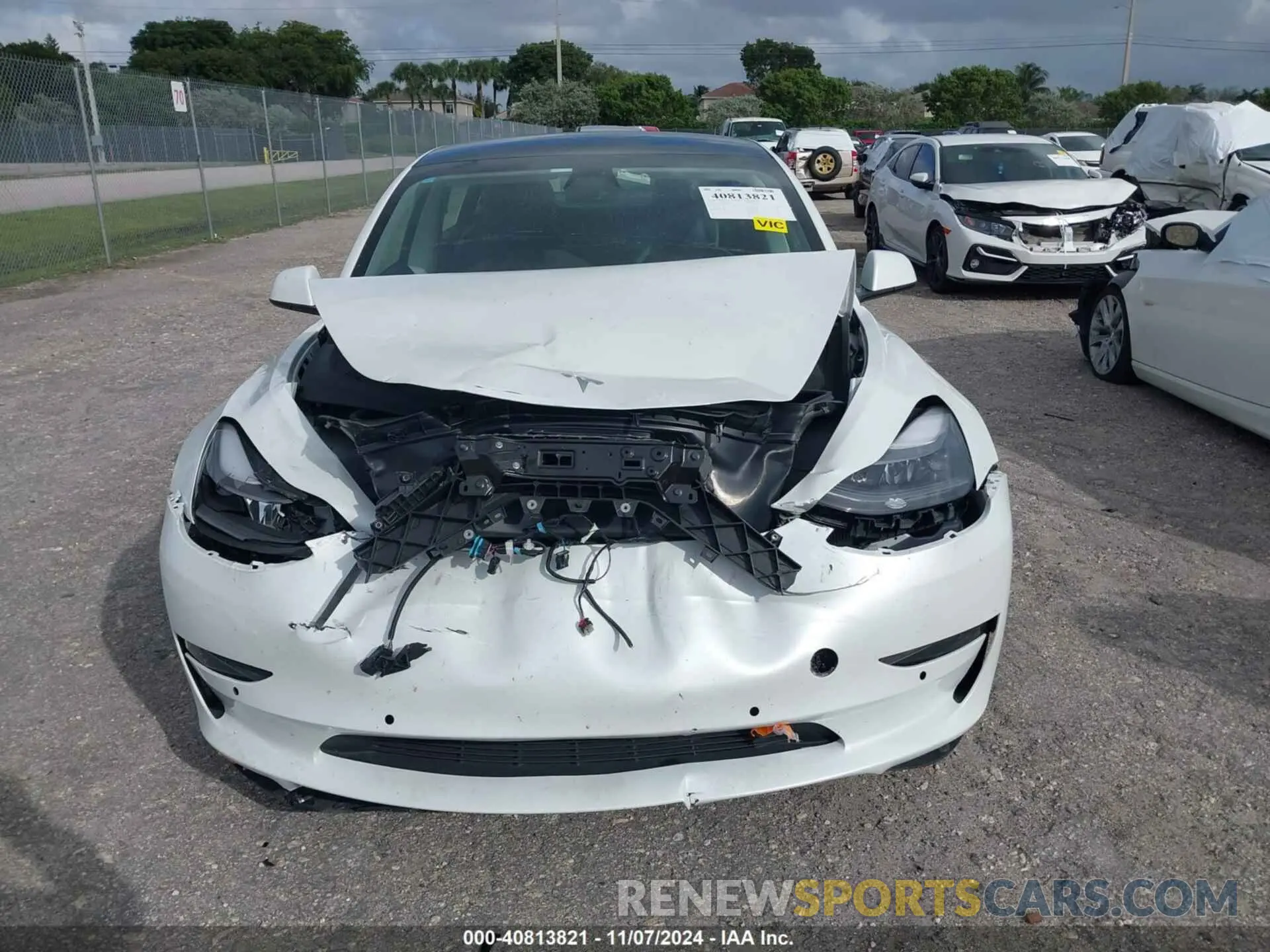 11 Photograph of a damaged car 5YJ3E1EA2MF990842 TESLA MODEL 3 2021