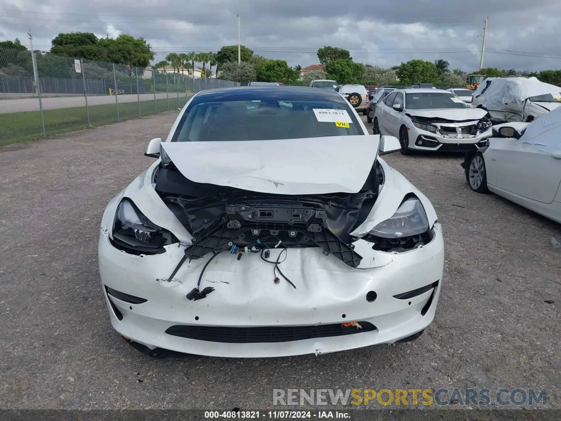 6 Photograph of a damaged car 5YJ3E1EA2MF990842 TESLA MODEL 3 2021