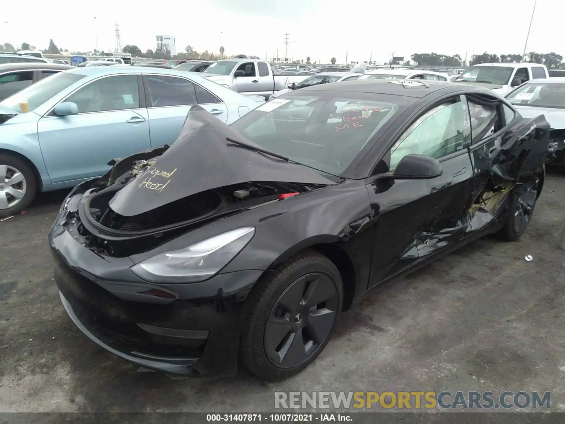 2 Photograph of a damaged car 5YJ3E1EA3MF002760 TESLA MODEL 3 2021