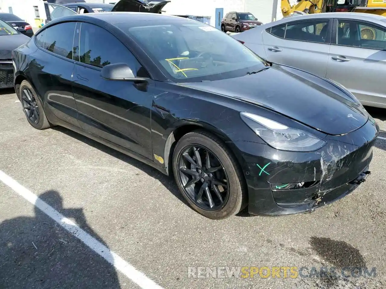 4 Photograph of a damaged car 5YJ3E1EA3MF016657 TESLA MODEL 3 2021