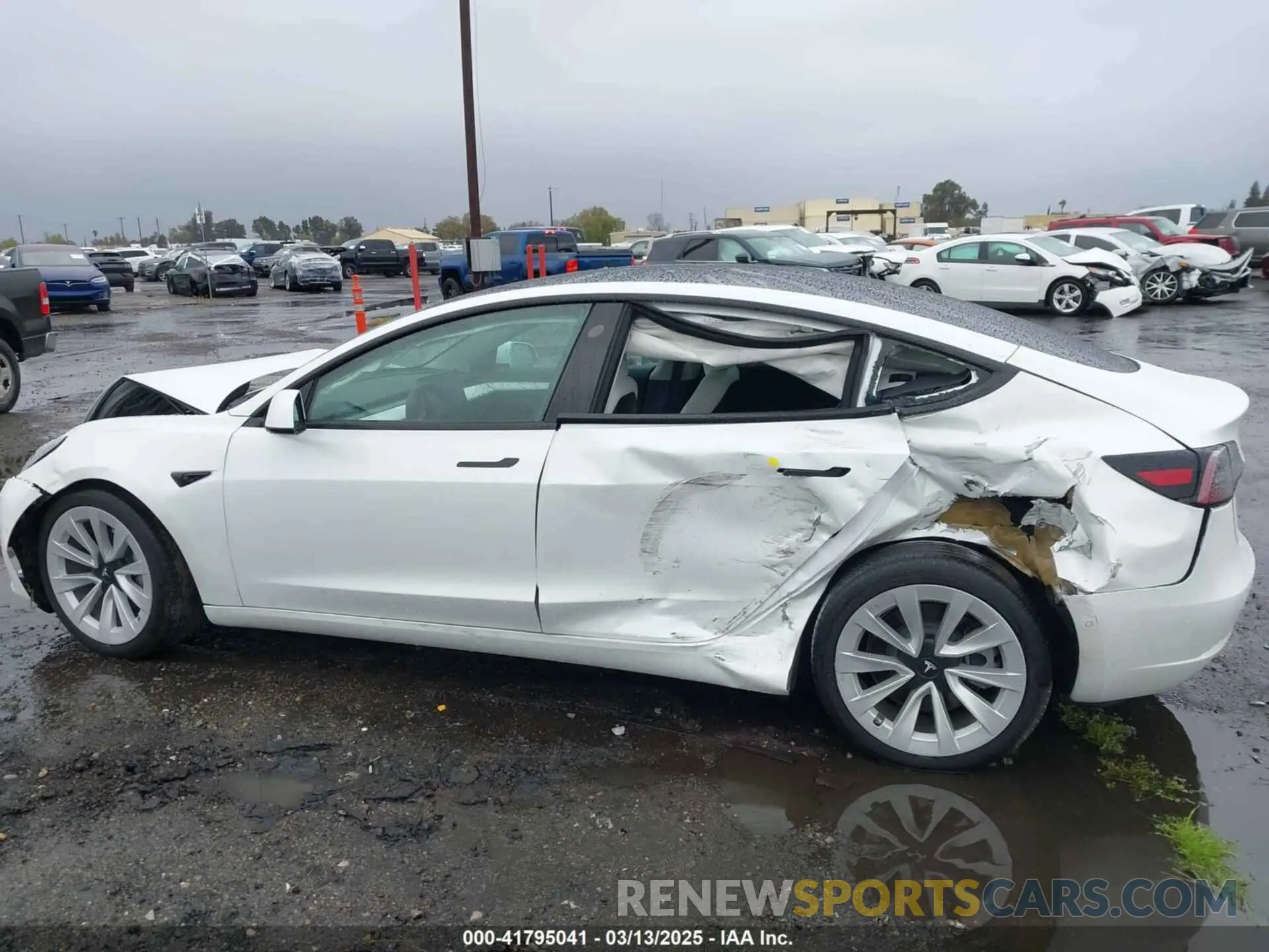 14 Photograph of a damaged car 5YJ3E1EA3MF032180 TESLA MODEL 3 2021