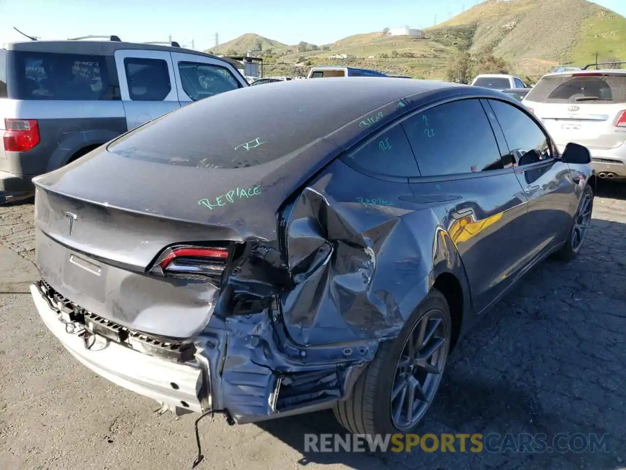 4 Photograph of a damaged car 5YJ3E1EA3MF051618 TESLA MODEL 3 2021