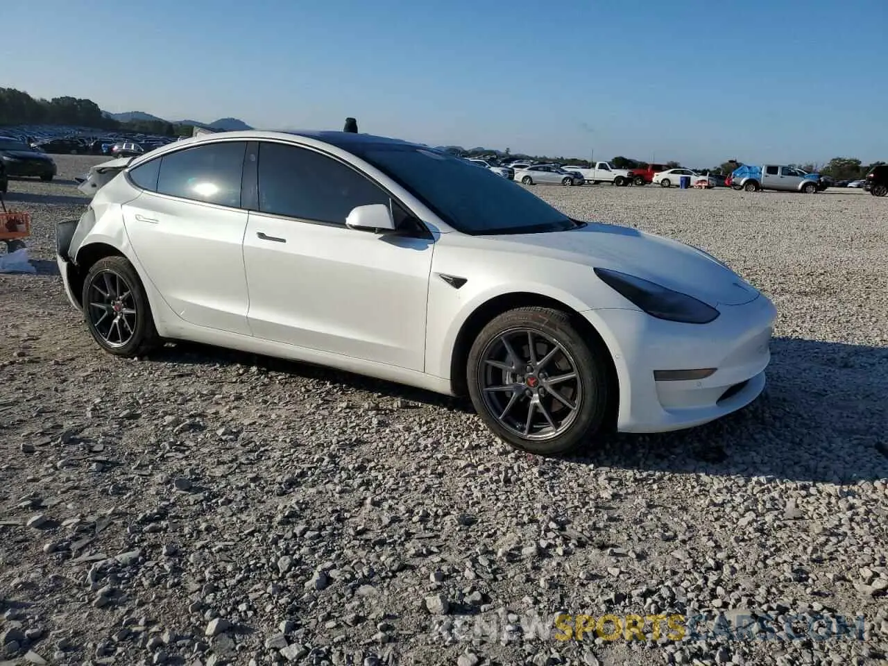 4 Photograph of a damaged car 5YJ3E1EA3MF058679 TESLA MODEL 3 2021