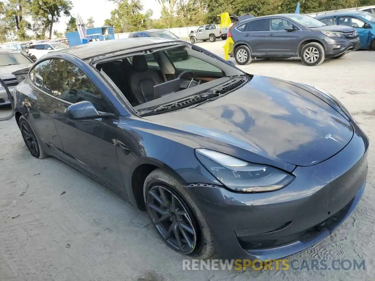 4 Photograph of a damaged car 5YJ3E1EA3MF070413 TESLA MODEL 3 2021