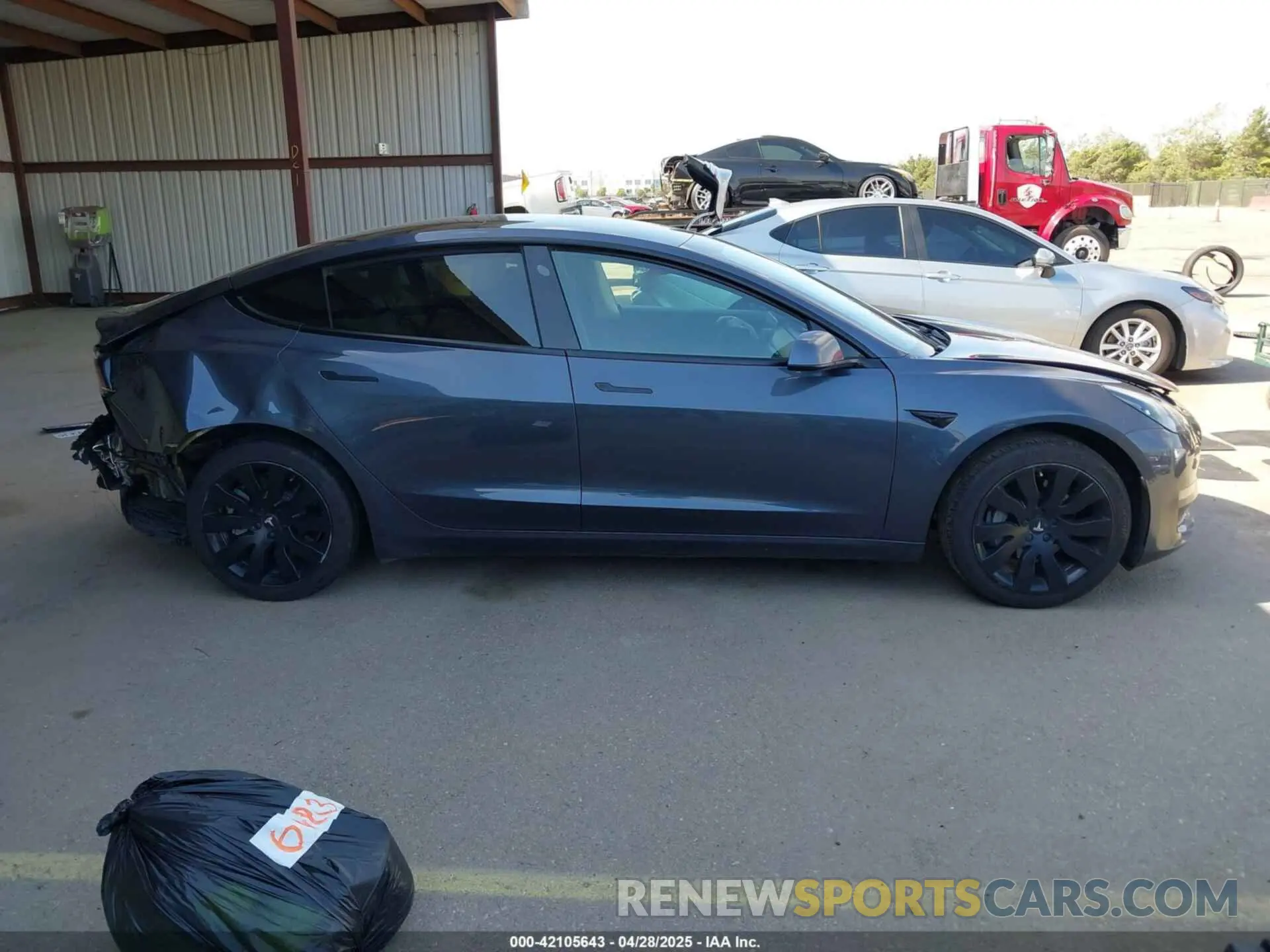 12 Photograph of a damaged car 5YJ3E1EA3MF877790 TESLA MODEL 3 2021