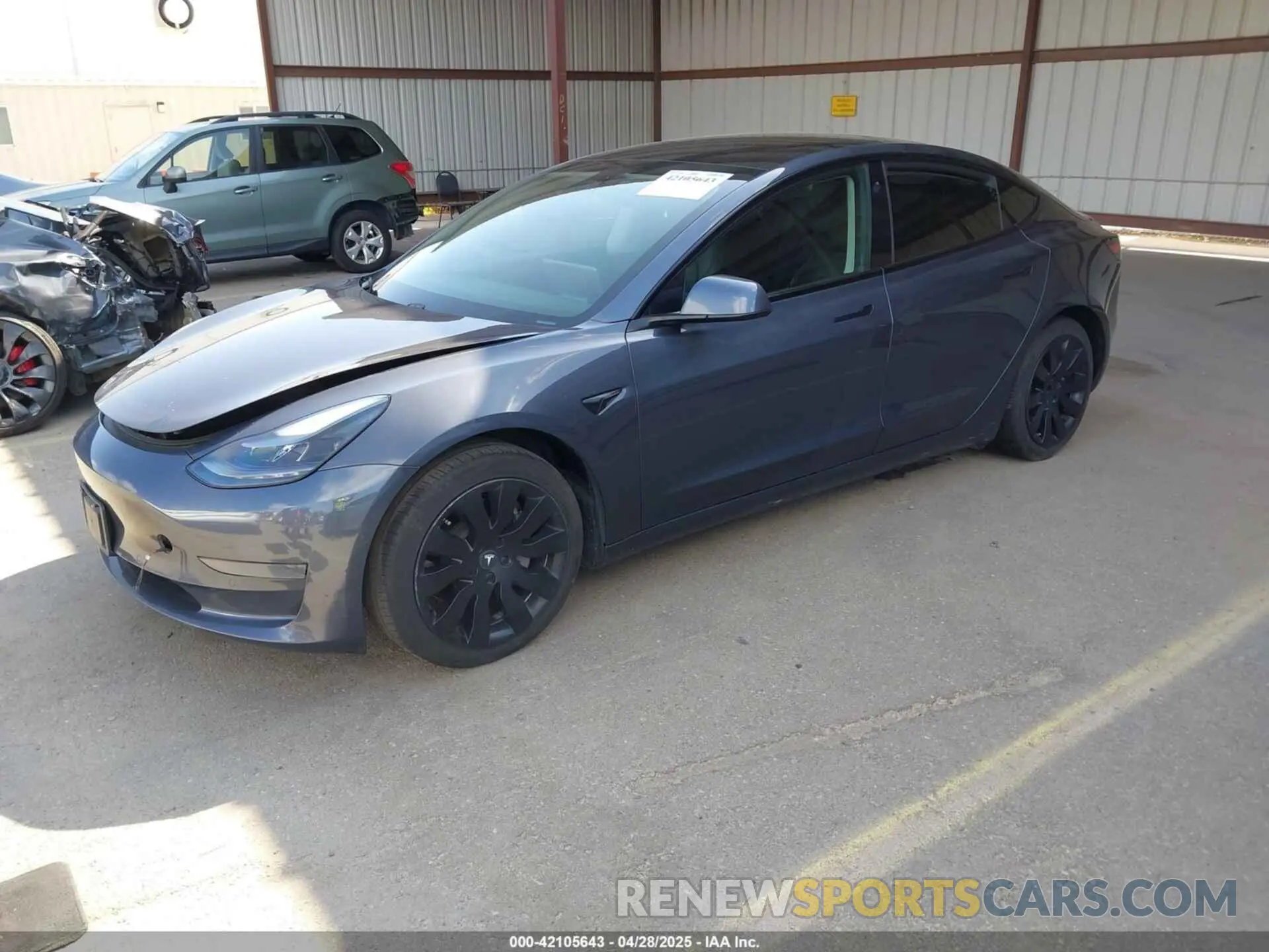 2 Photograph of a damaged car 5YJ3E1EA3MF877790 TESLA MODEL 3 2021