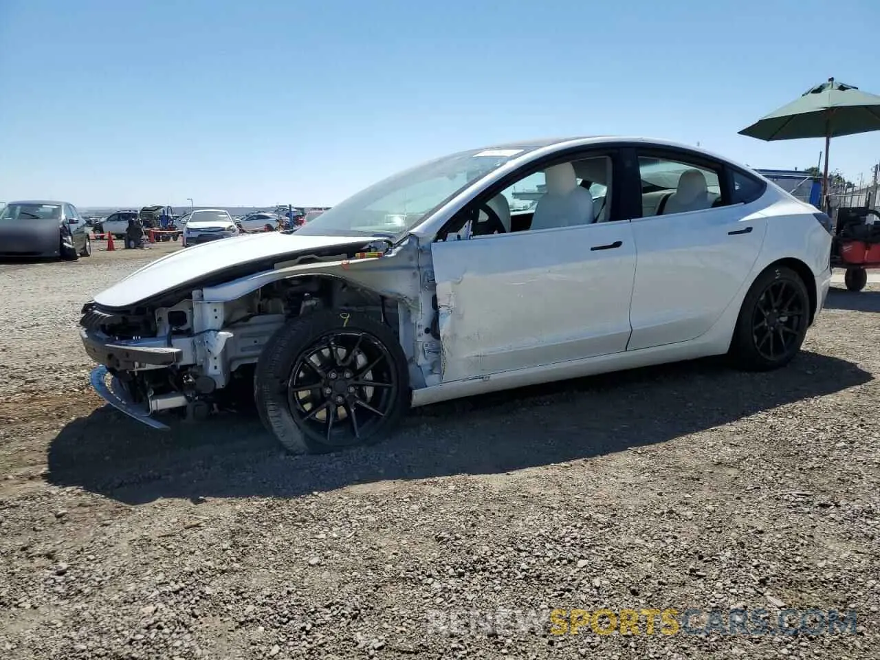 1 Photograph of a damaged car 5YJ3E1EA3MF877904 TESLA MODEL 3 2021