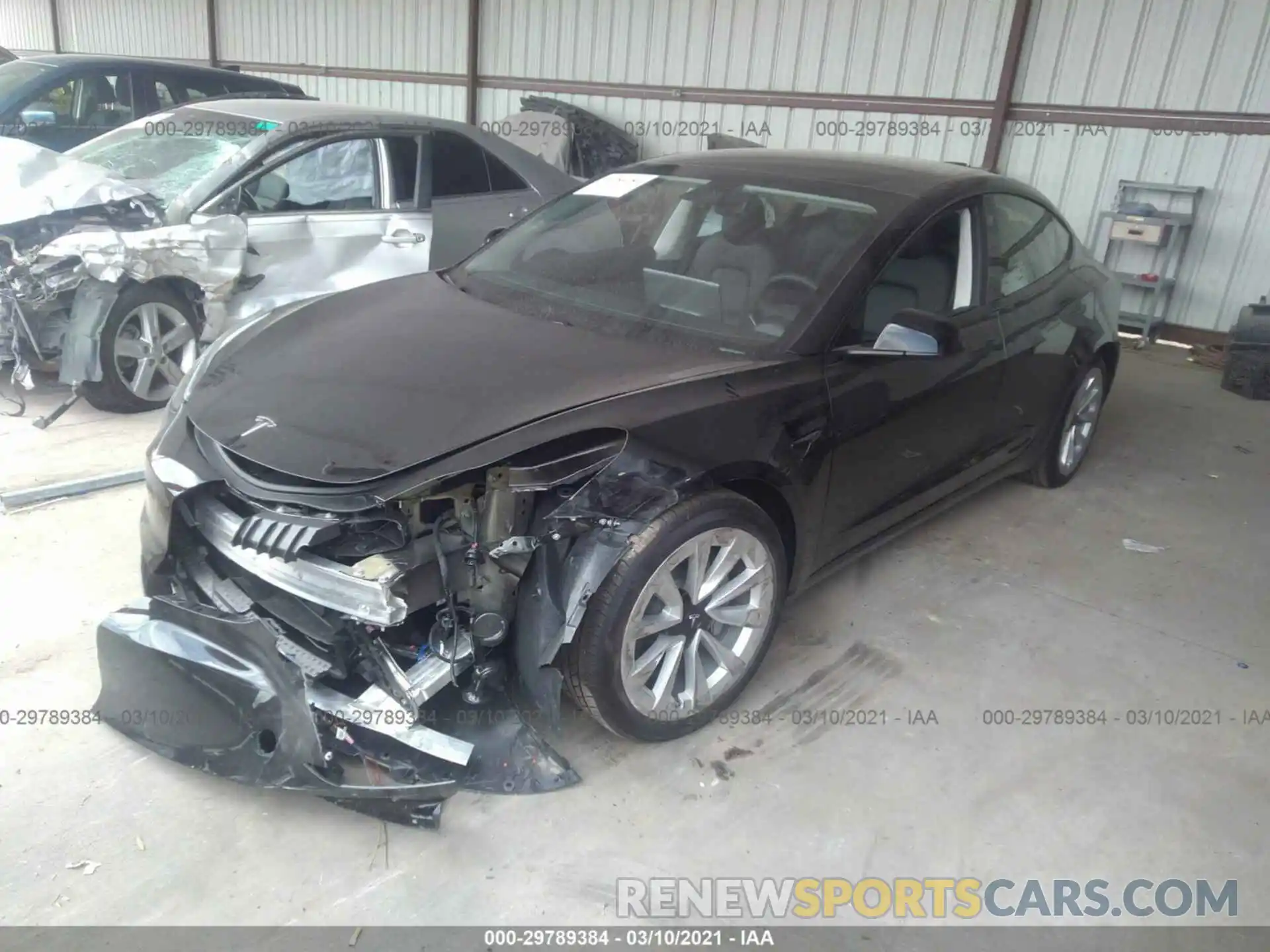 2 Photograph of a damaged car 5YJ3E1EA3MF908049 TESLA MODEL 3 2021