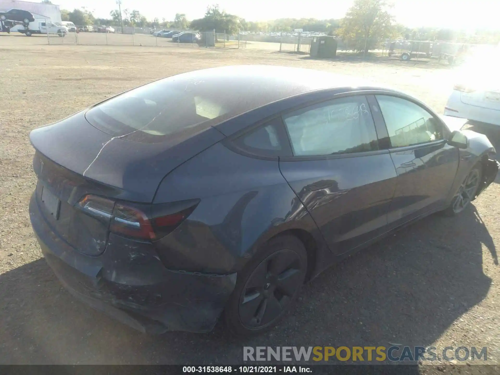 4 Photograph of a damaged car 5YJ3E1EA3MF914868 TESLA MODEL 3 2021