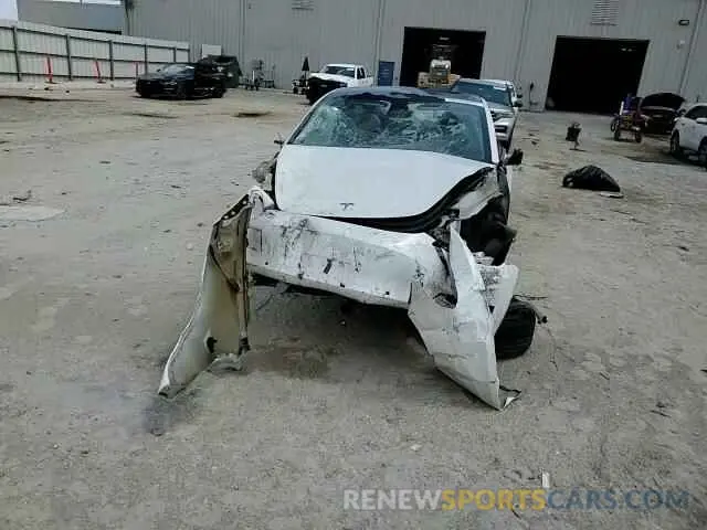 13 Photograph of a damaged car 5YJ3E1EA3MF976870 TESLA MODEL 3 2021